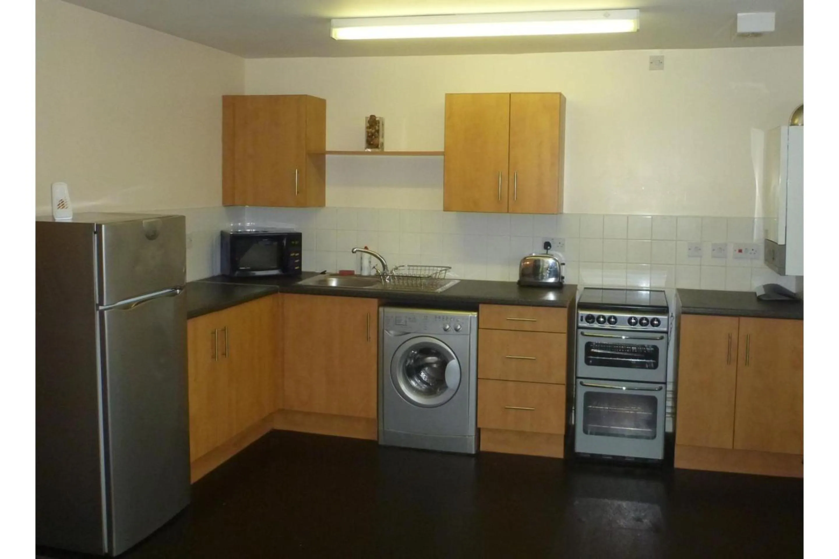 Kitchen or kitchenette, Kitchen/Kitchenette in OYO Arinza Apartments