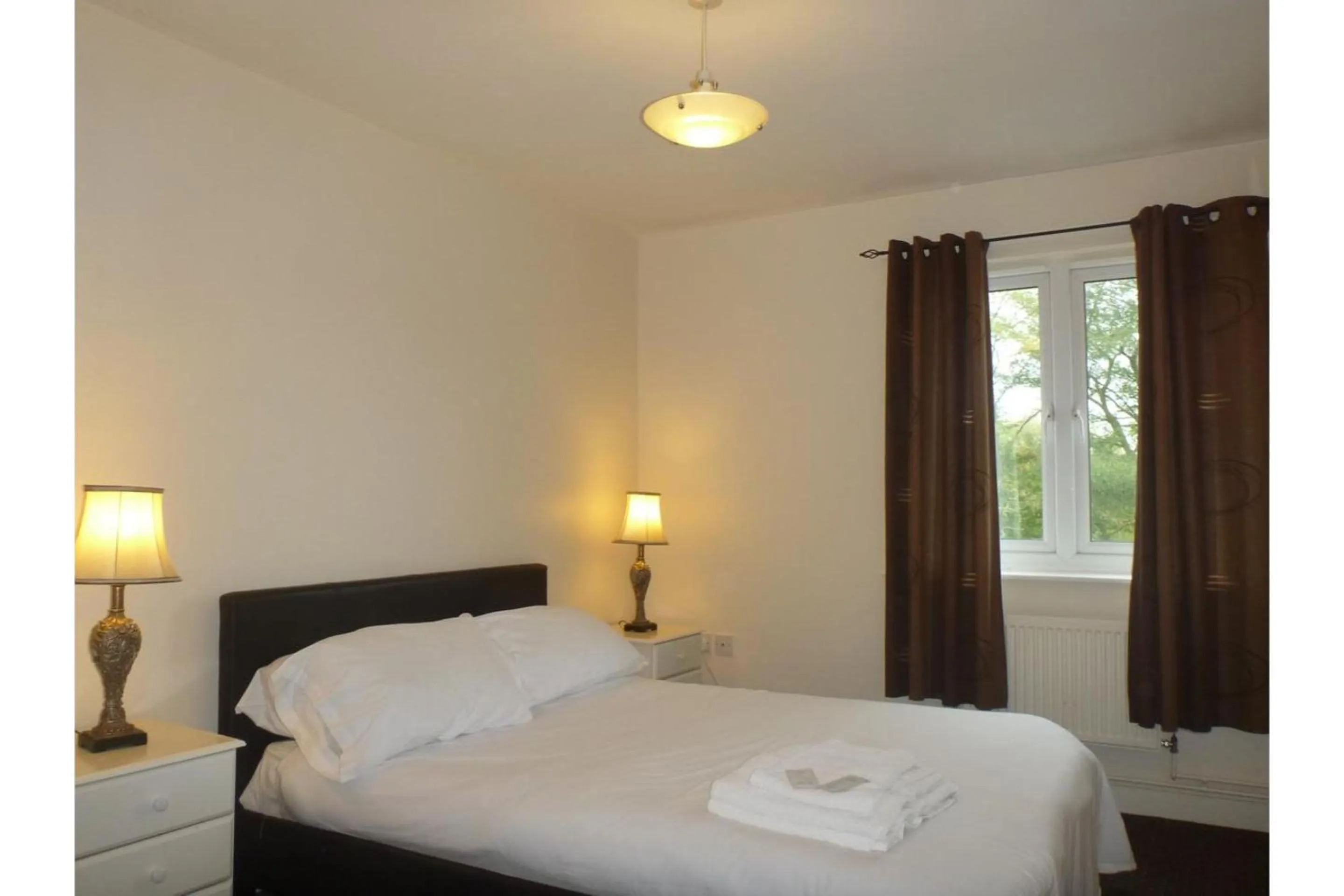 Bedroom in OYO Arinza Apartments