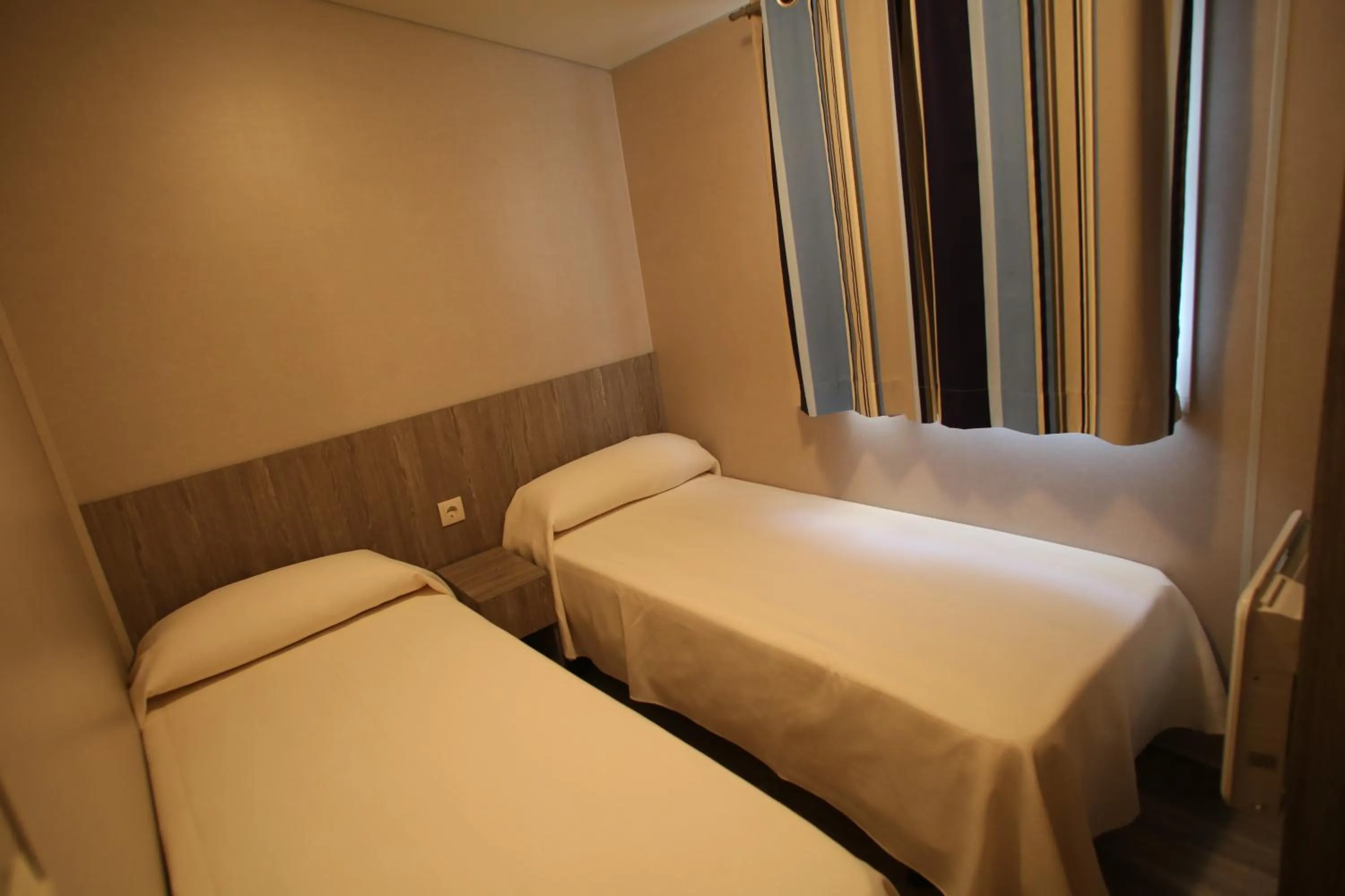 Bedroom, Bed in Bungalows y Mobil Homes Camping Regio