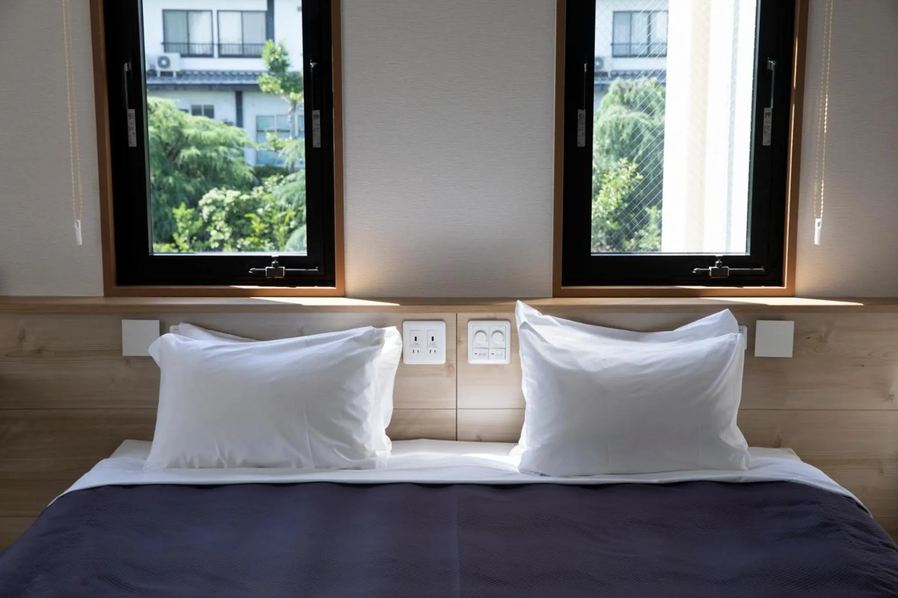 Bed in 宮島離れの宿 IBUKU -Miyajima Hanare no Yado IBUKU-