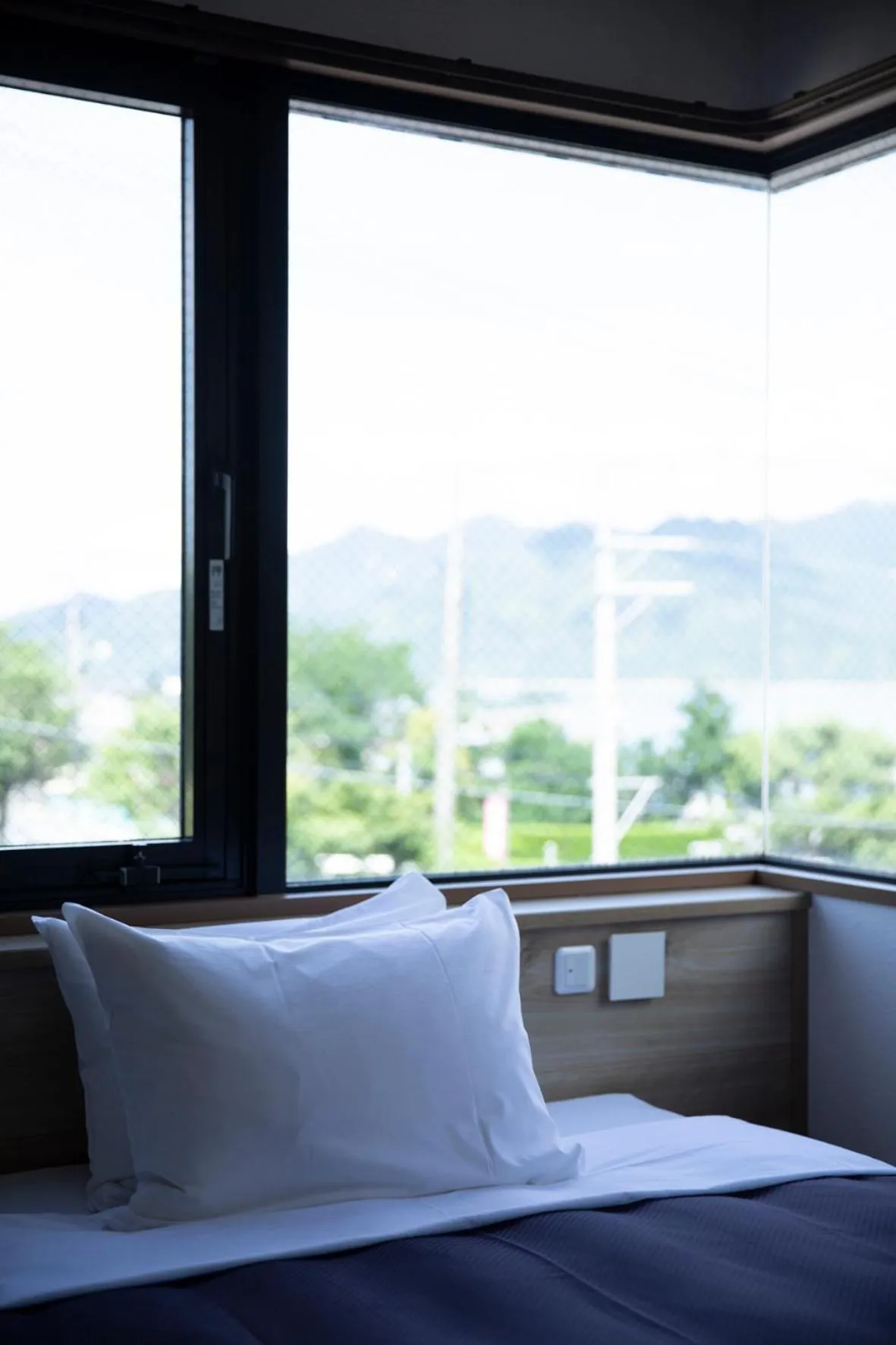 Bed in 宮島離れの宿 IBUKU -Miyajima Hanare no Yado IBUKU-