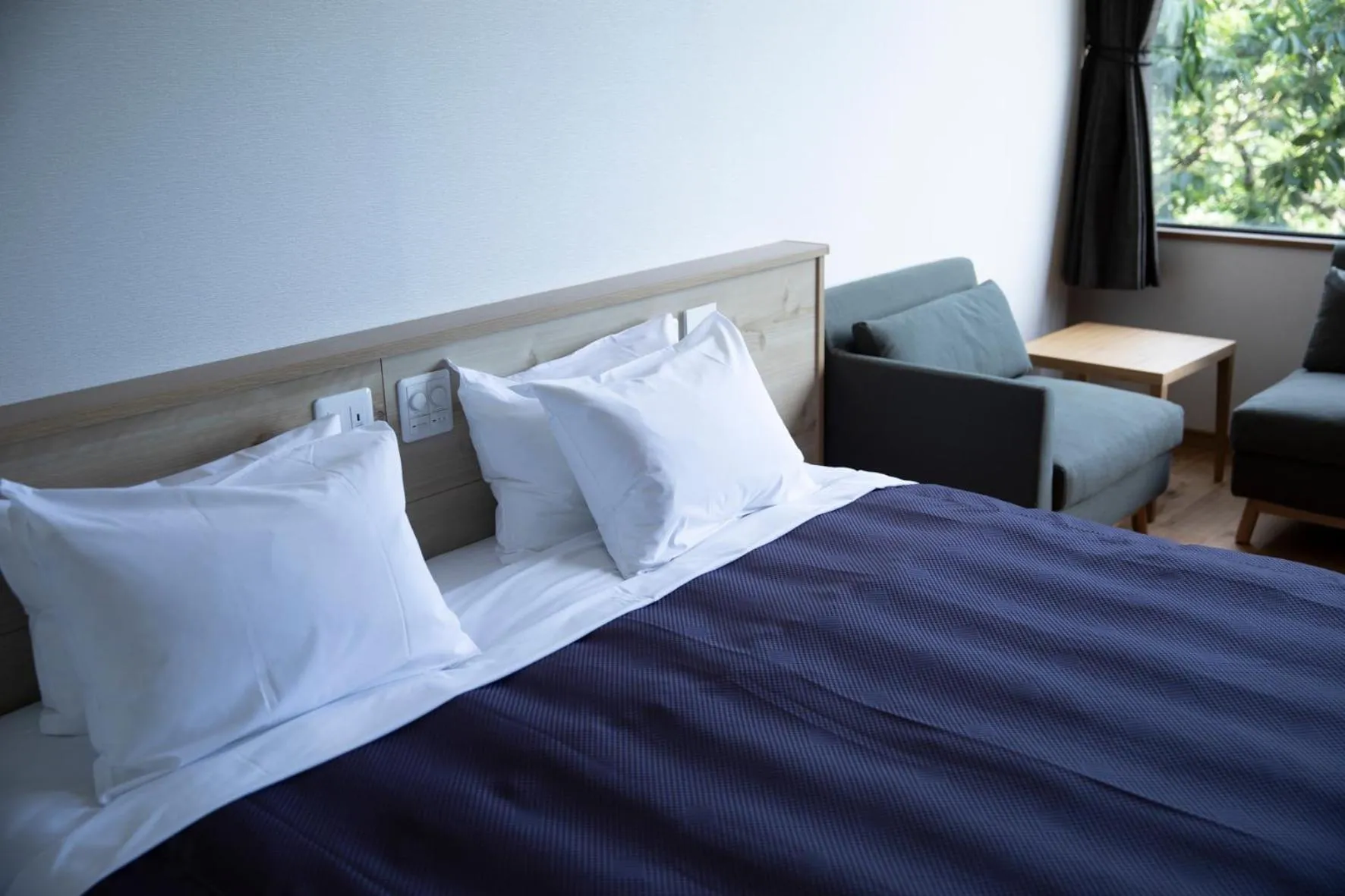 Bed in 宮島離れの宿 IBUKU -Miyajima Hanare no Yado IBUKU-