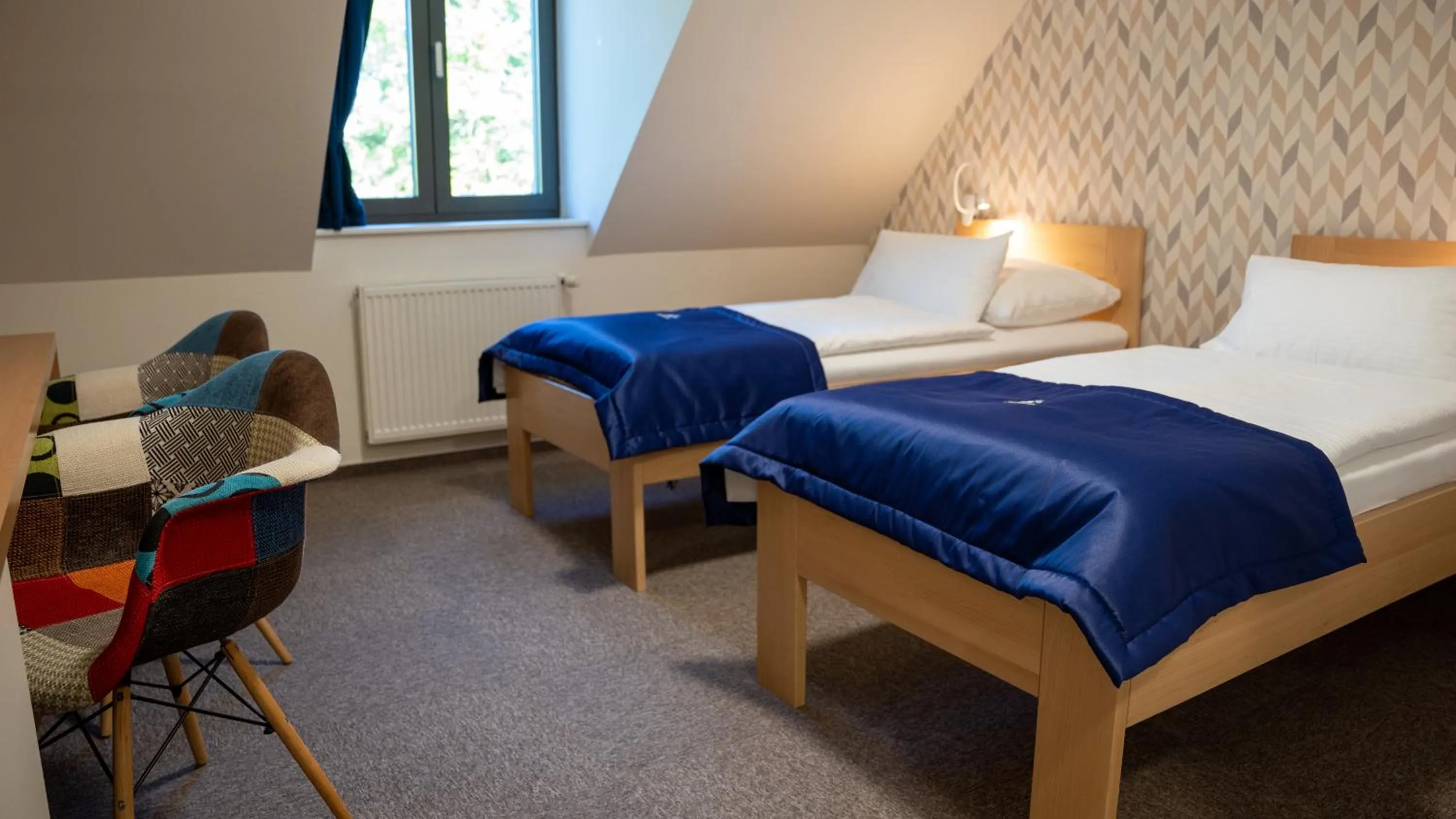 Bed in HOTEL Hraniční zámeček