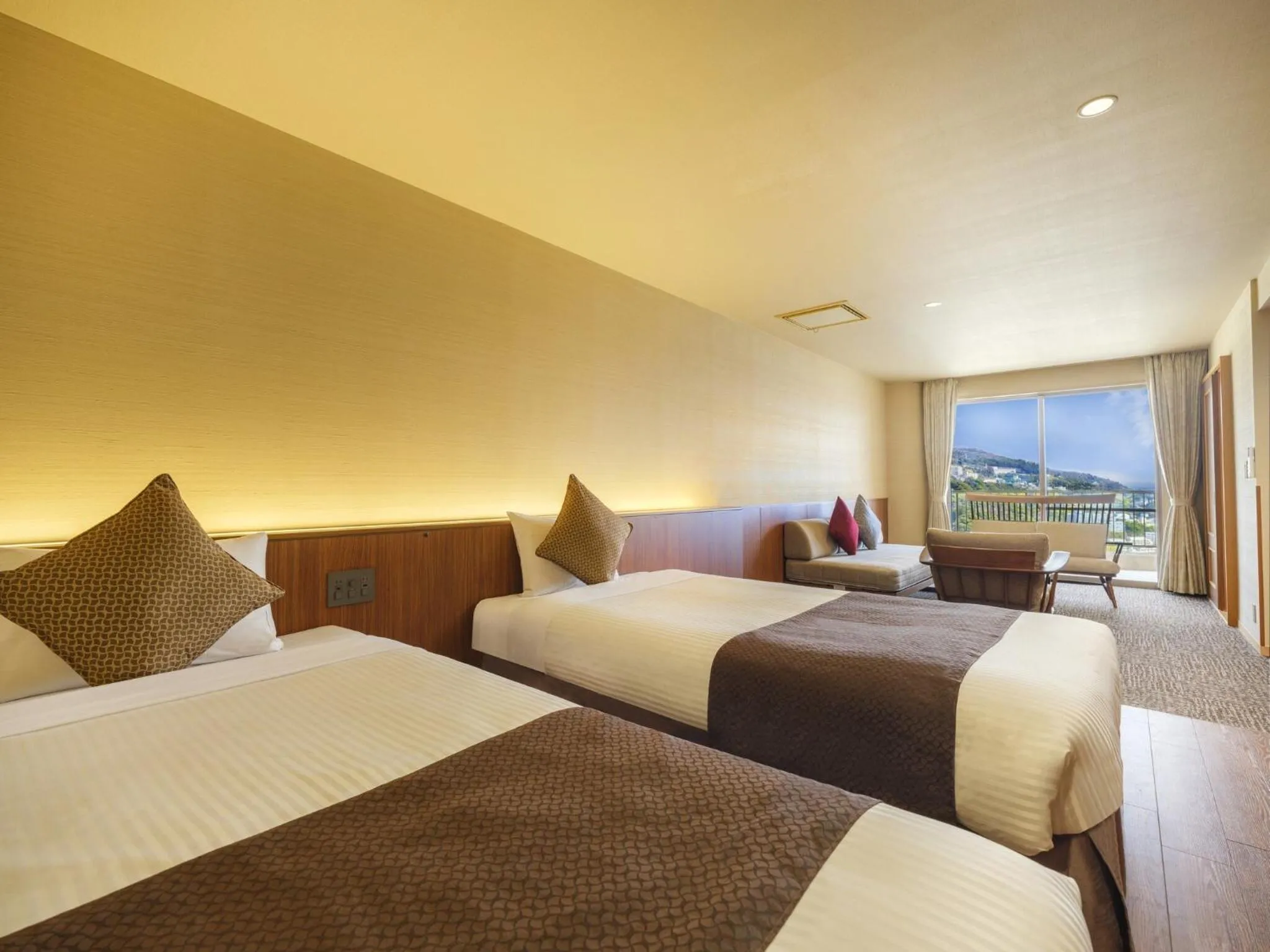 Bed in KAMENOI HOTEL Atami