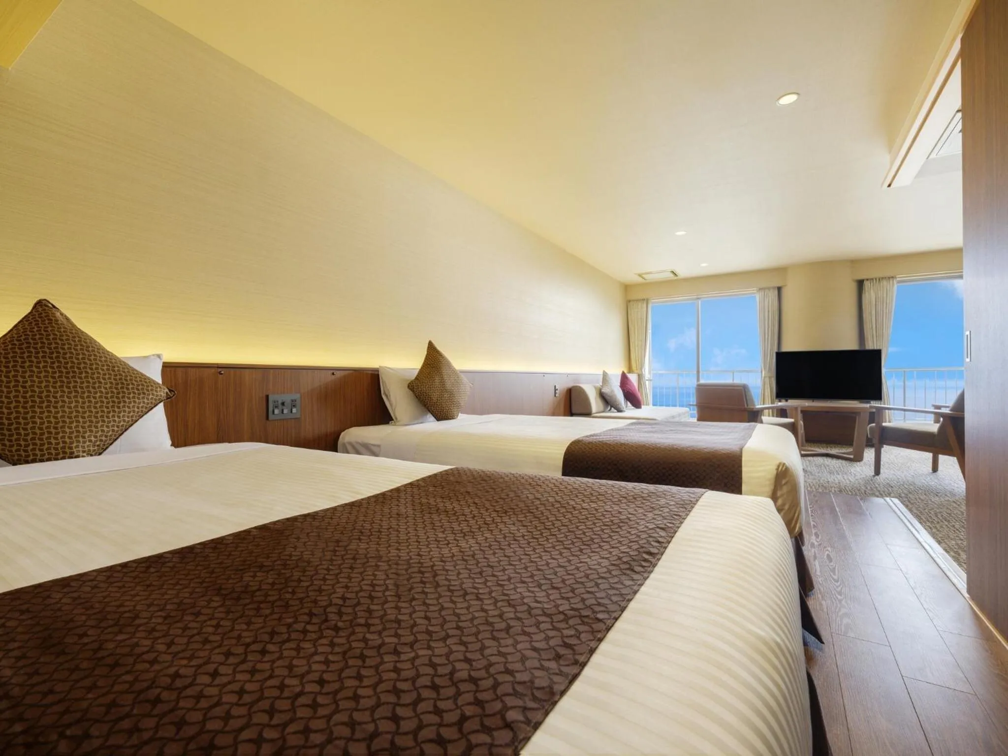 Bed in KAMENOI HOTEL Atami