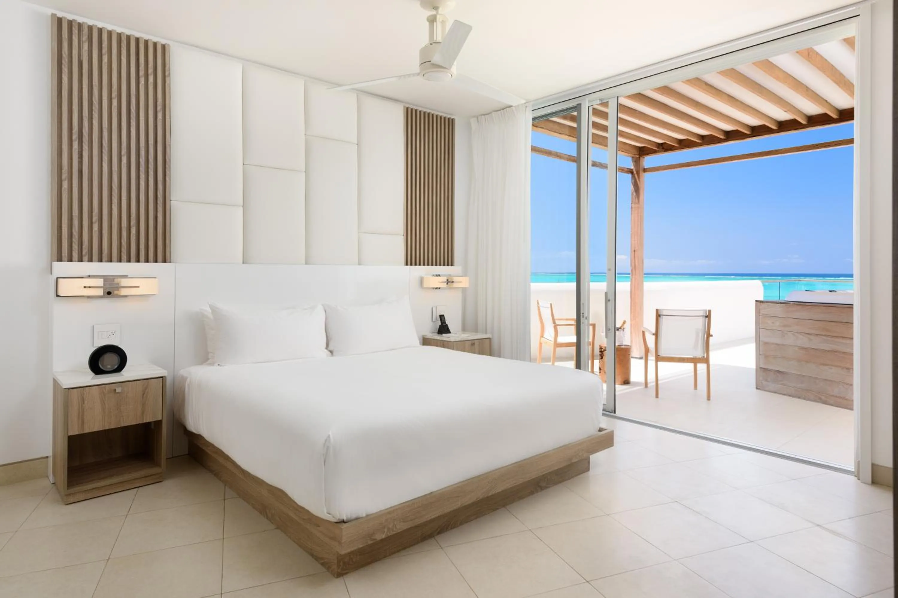 Bed in Wymara Resort & Villas
