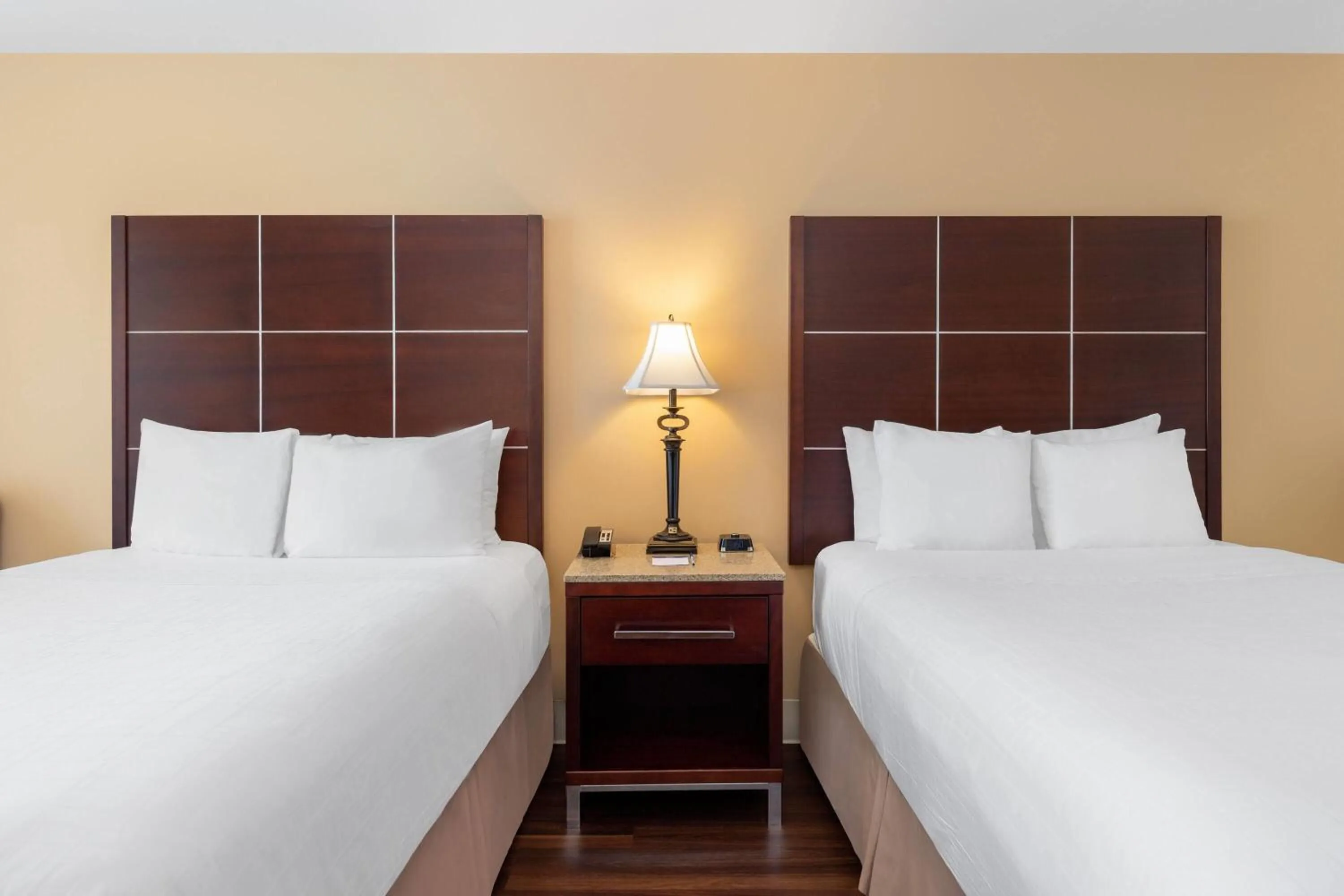 Bed in Wyndham Riverfront Hotel