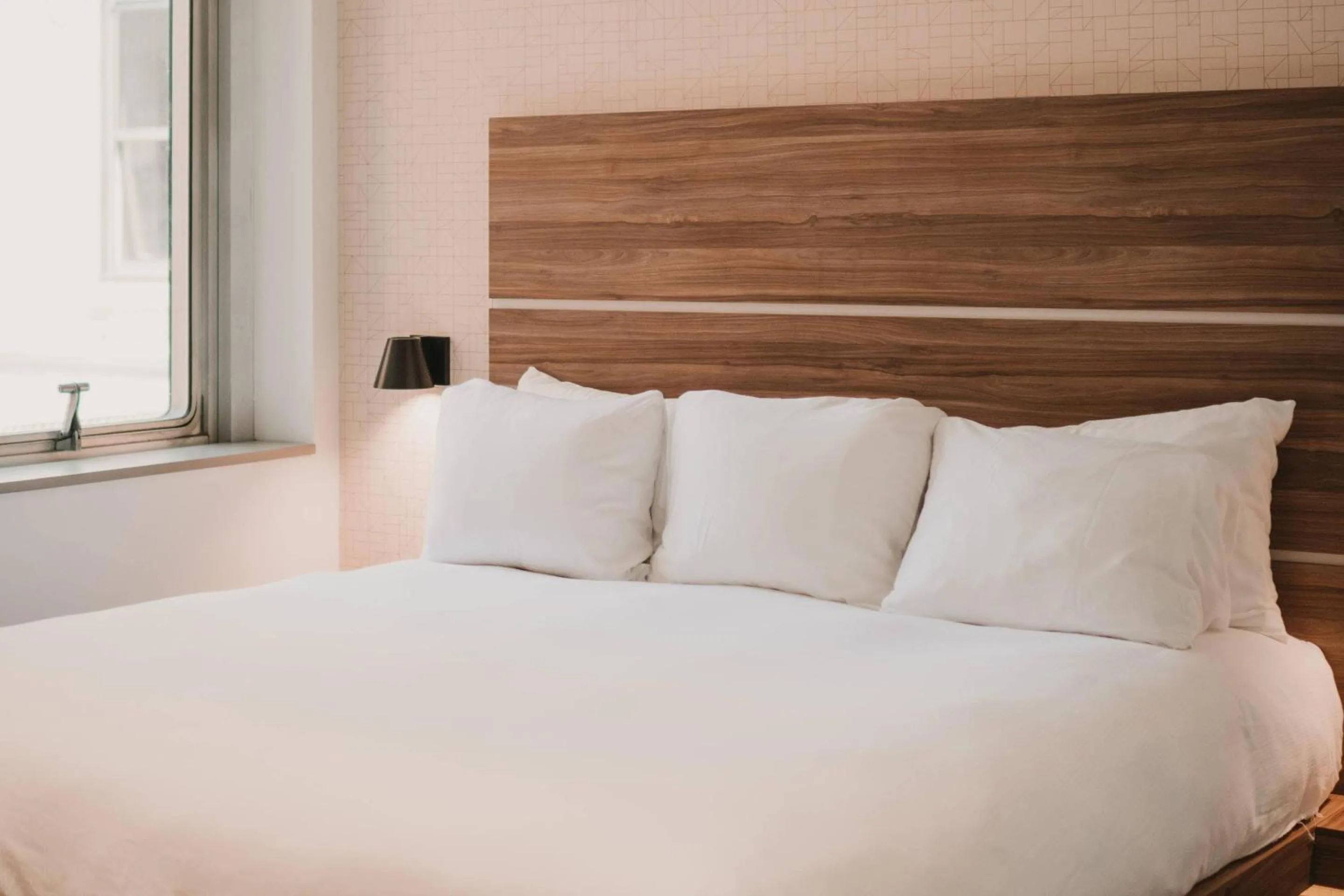 Bedroom, Bed in CityFlatsHotel - Grand Rapids, an Ascend Collection Hotel