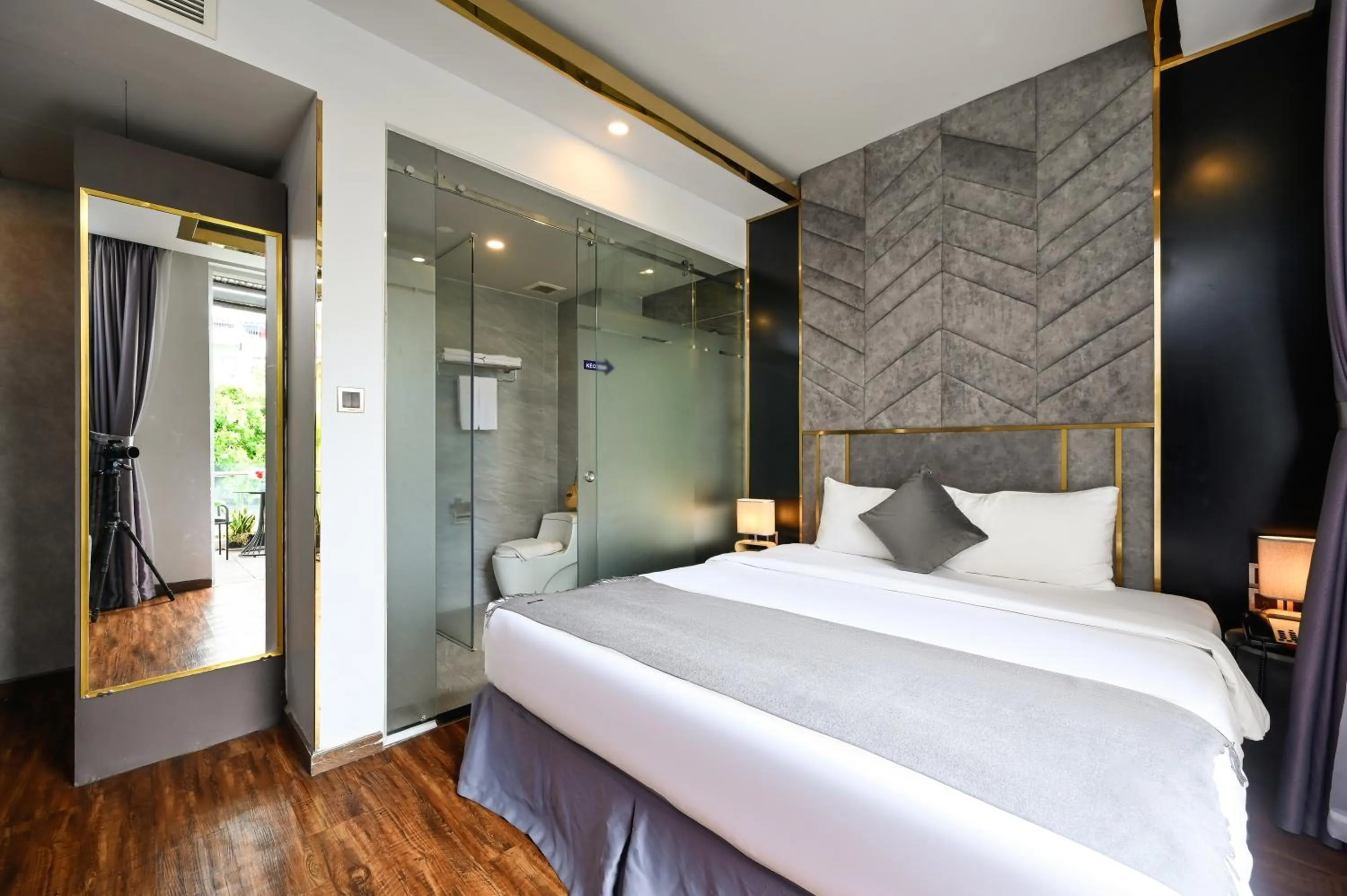 Photo of the whole room, Bed in Cicilia Saigon Center