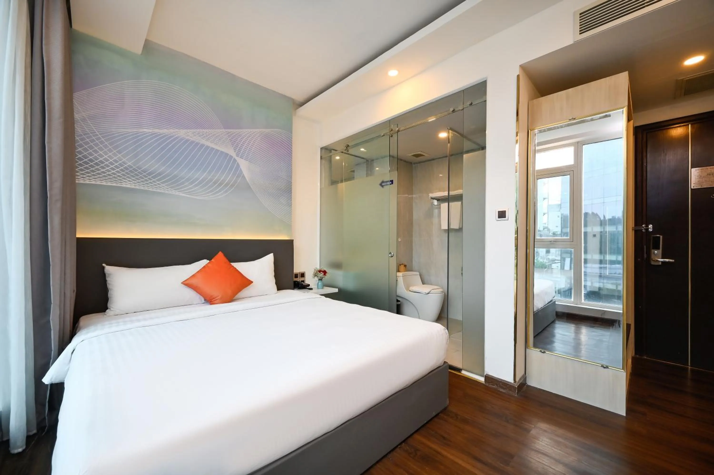 Photo of the whole room, Bed in Cicilia Saigon Center