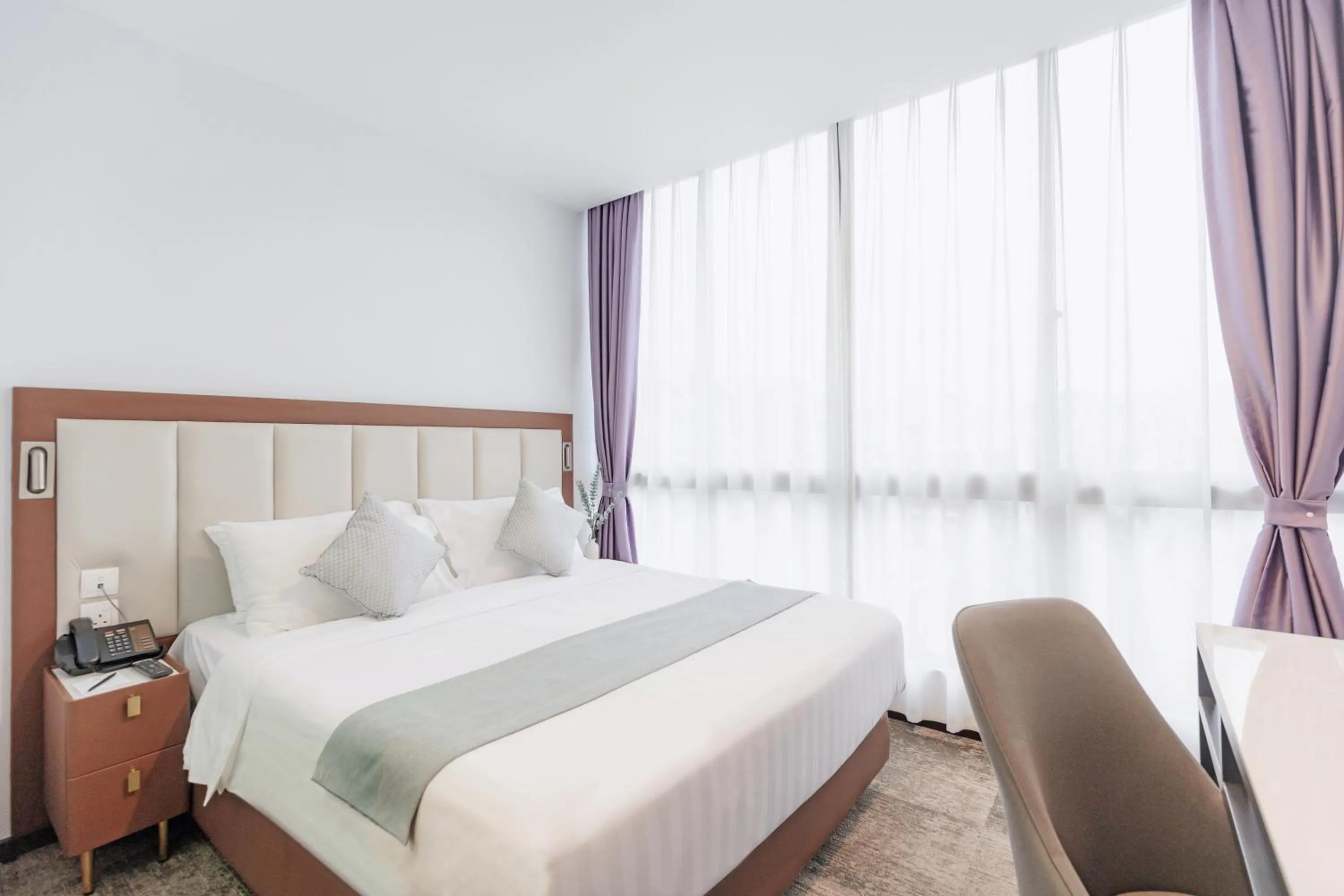 Bed in Santa Grand Hotel East Coast a NuVe Group Collection