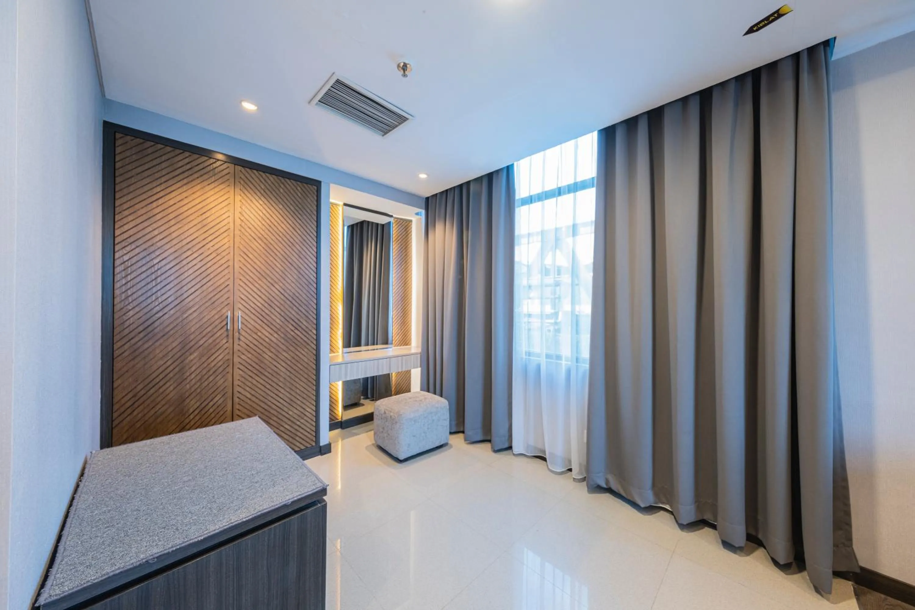 Photo of the whole room, Bed in Grand Jatra Hotel Pekanbaru