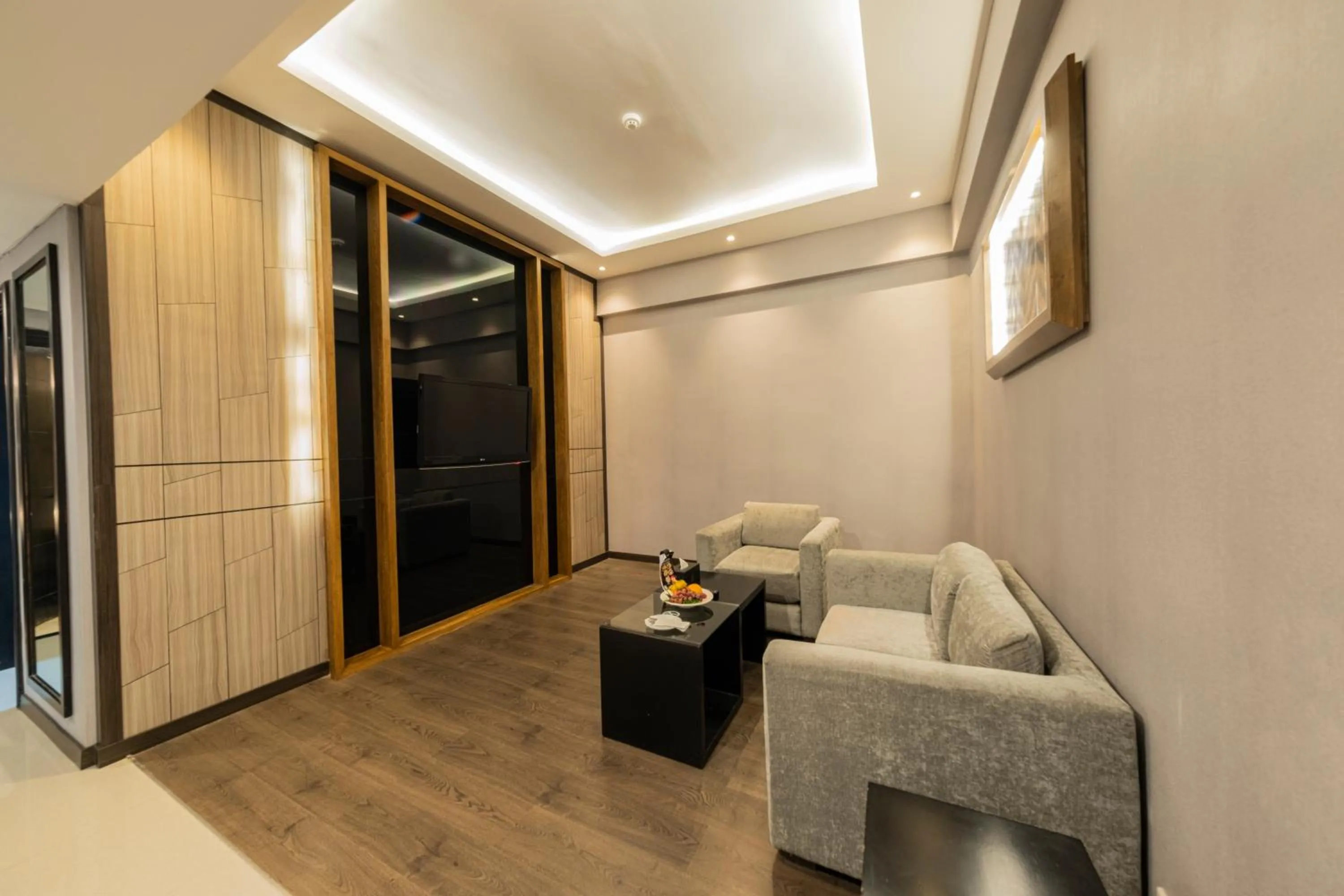 Living room in Grand Jatra Hotel Pekanbaru