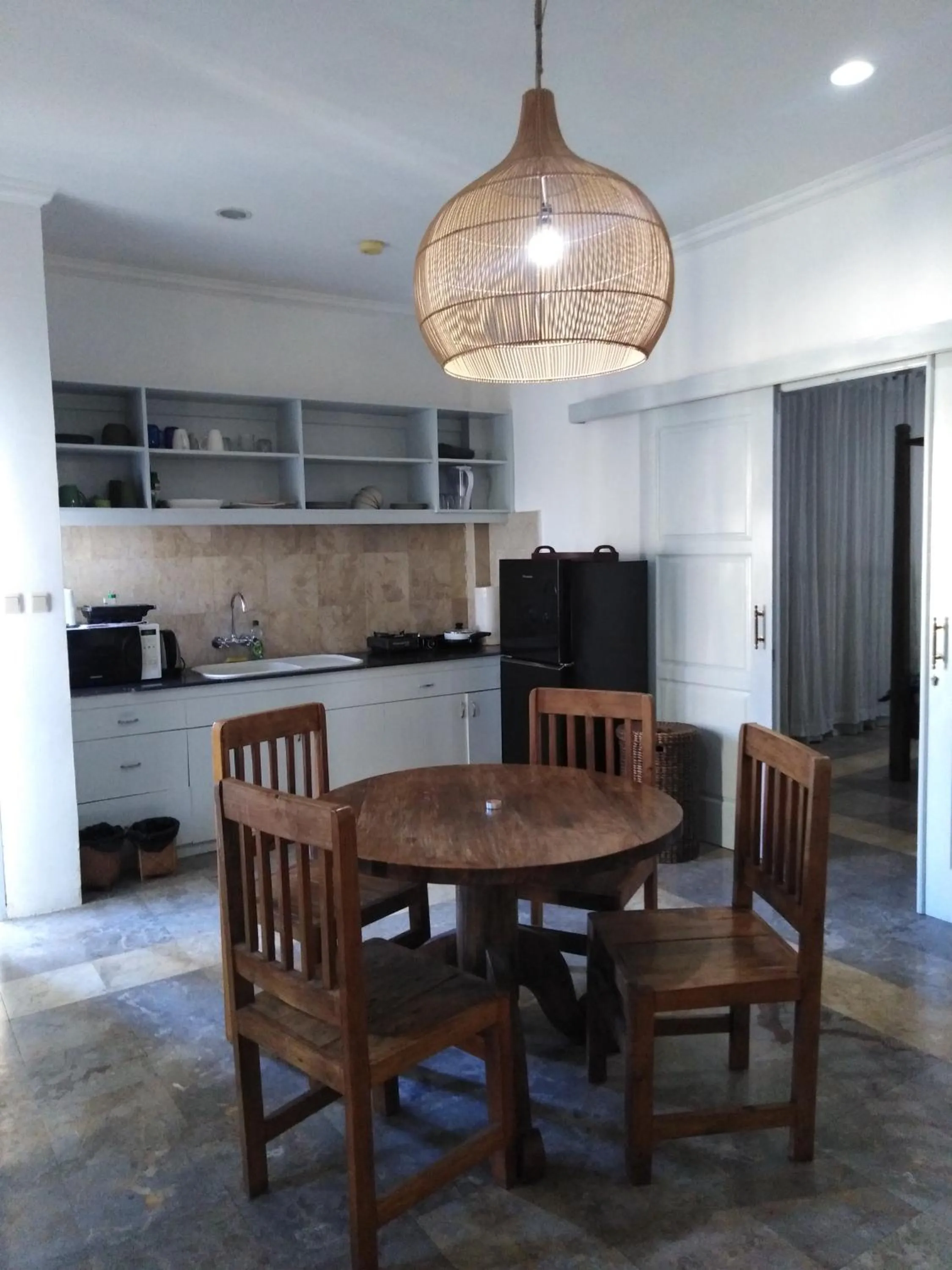 Kitchen or kitchenette in Bali Court Hotel & Apartment