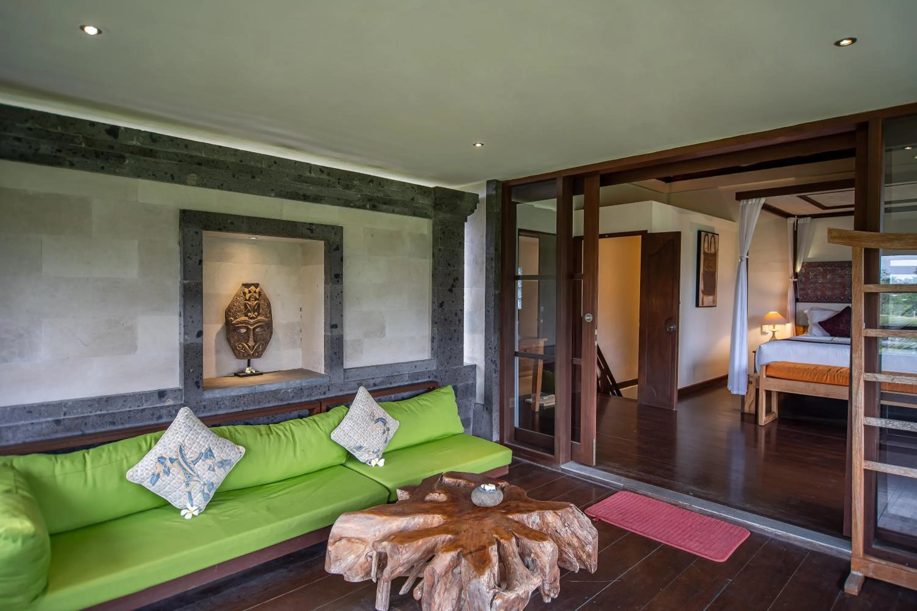 Bed in D'Legon Villas