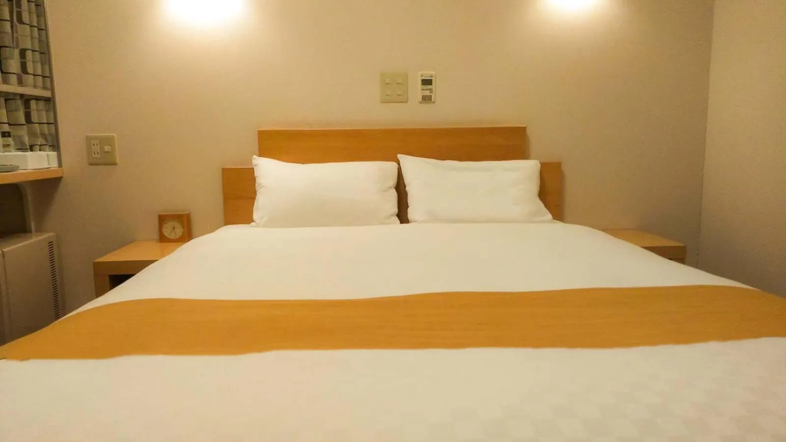 Bed in Smile Hotel Matsuyama