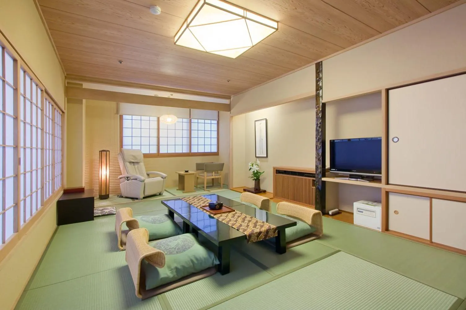 Living room, Bed in Dogo Prince Hotel