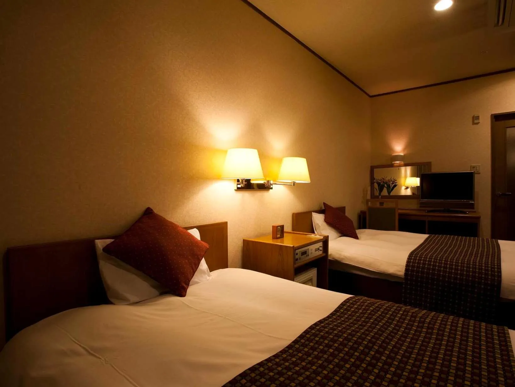 Bed in Dogo Prince Hotel