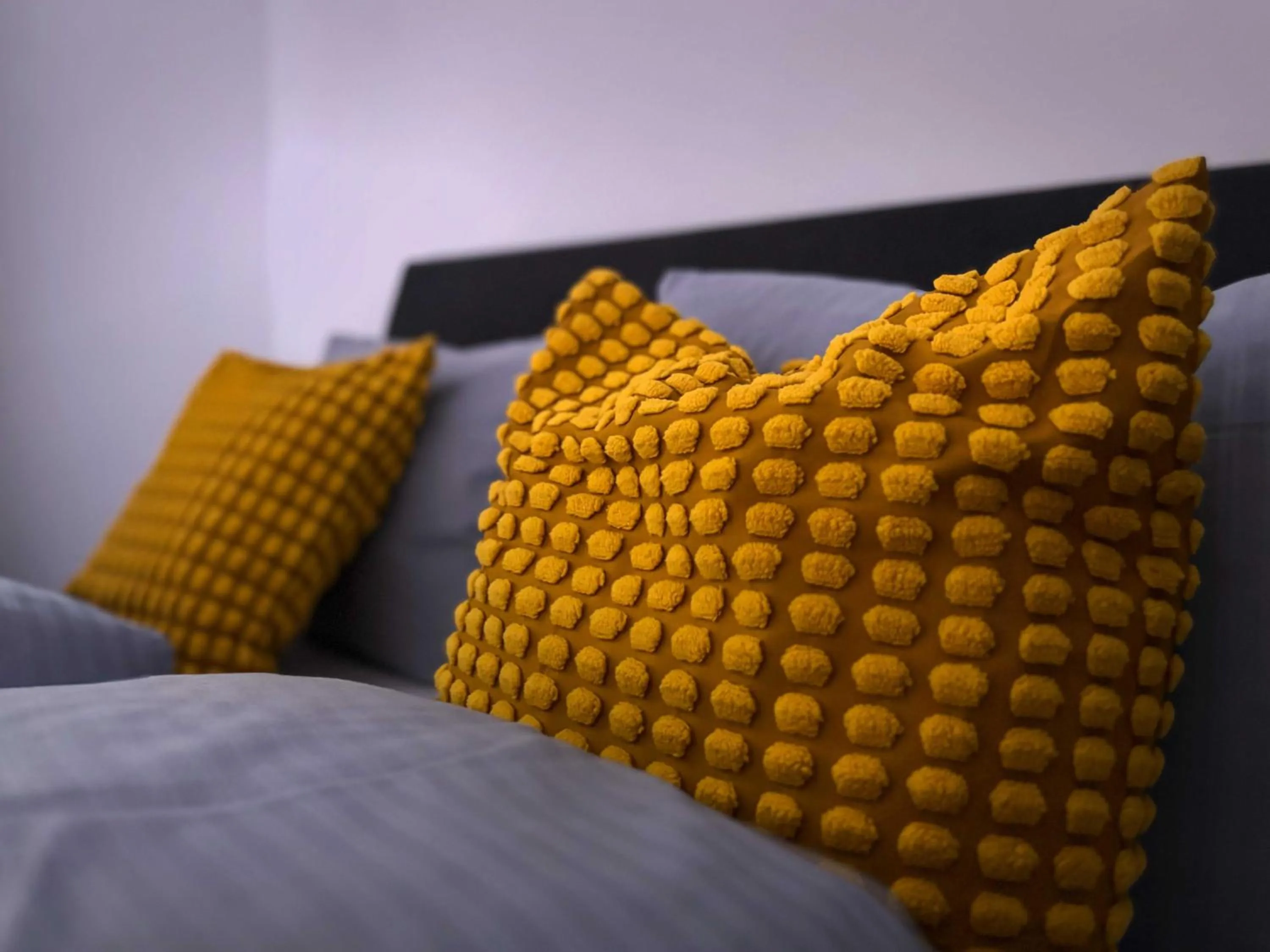 Bed in Pension Almhof Baumgarten