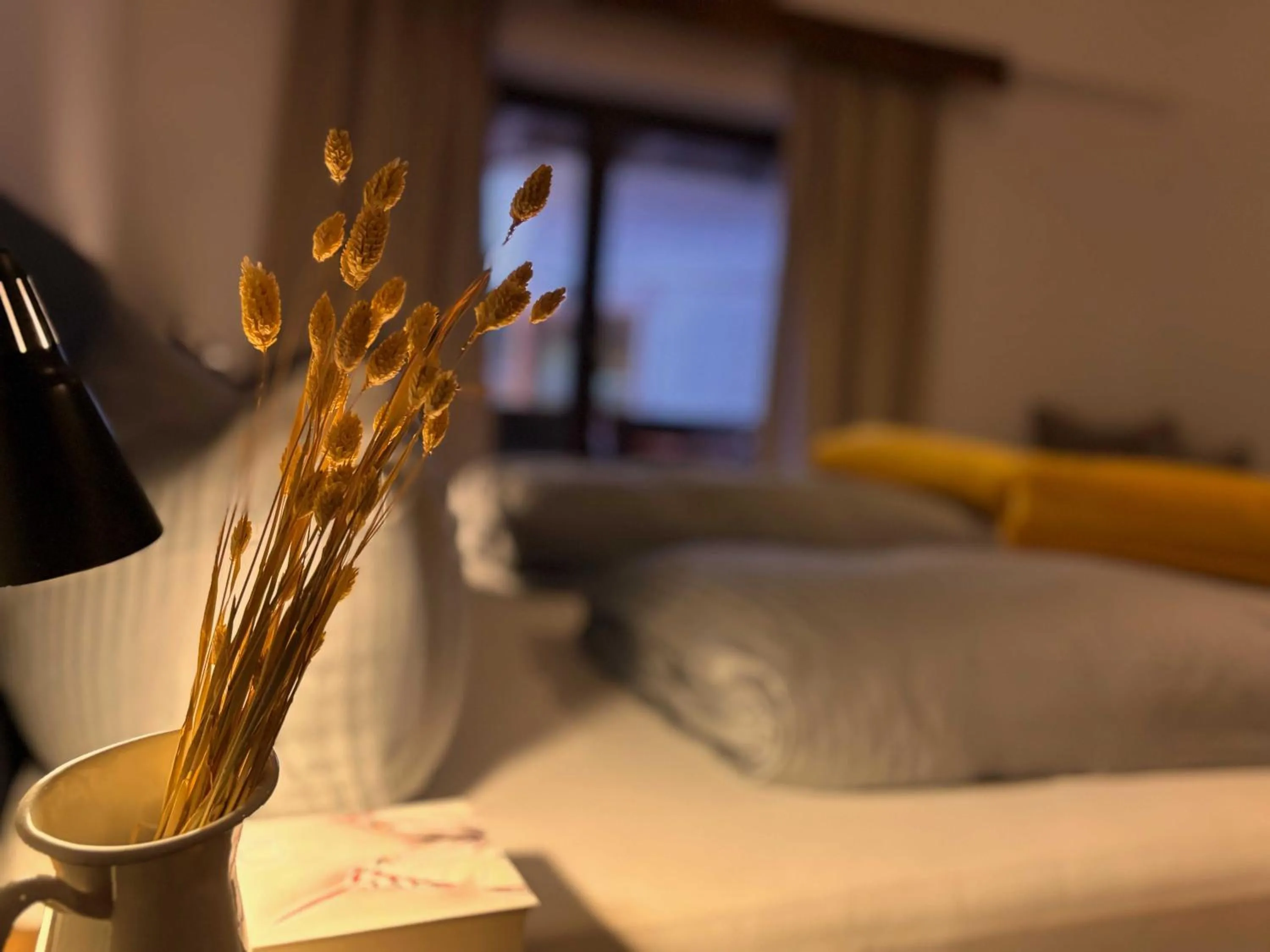 Bed in Pension Almhof Baumgarten