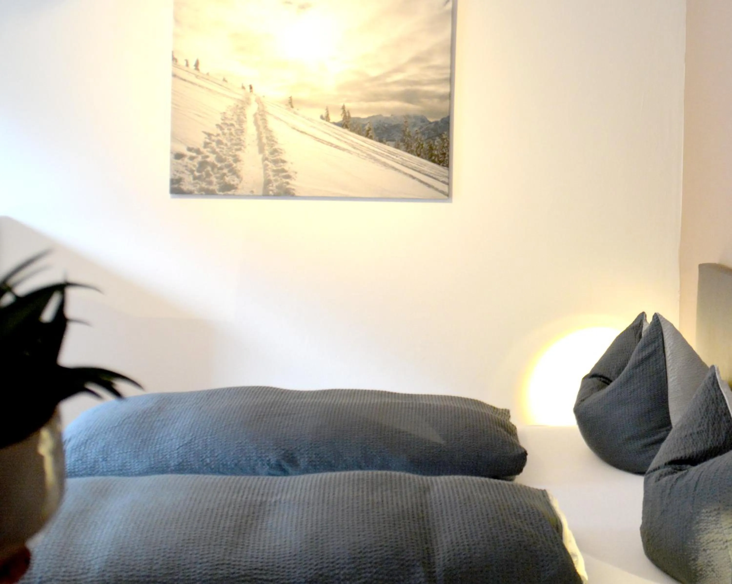 Bed in Pension Almhof Baumgarten