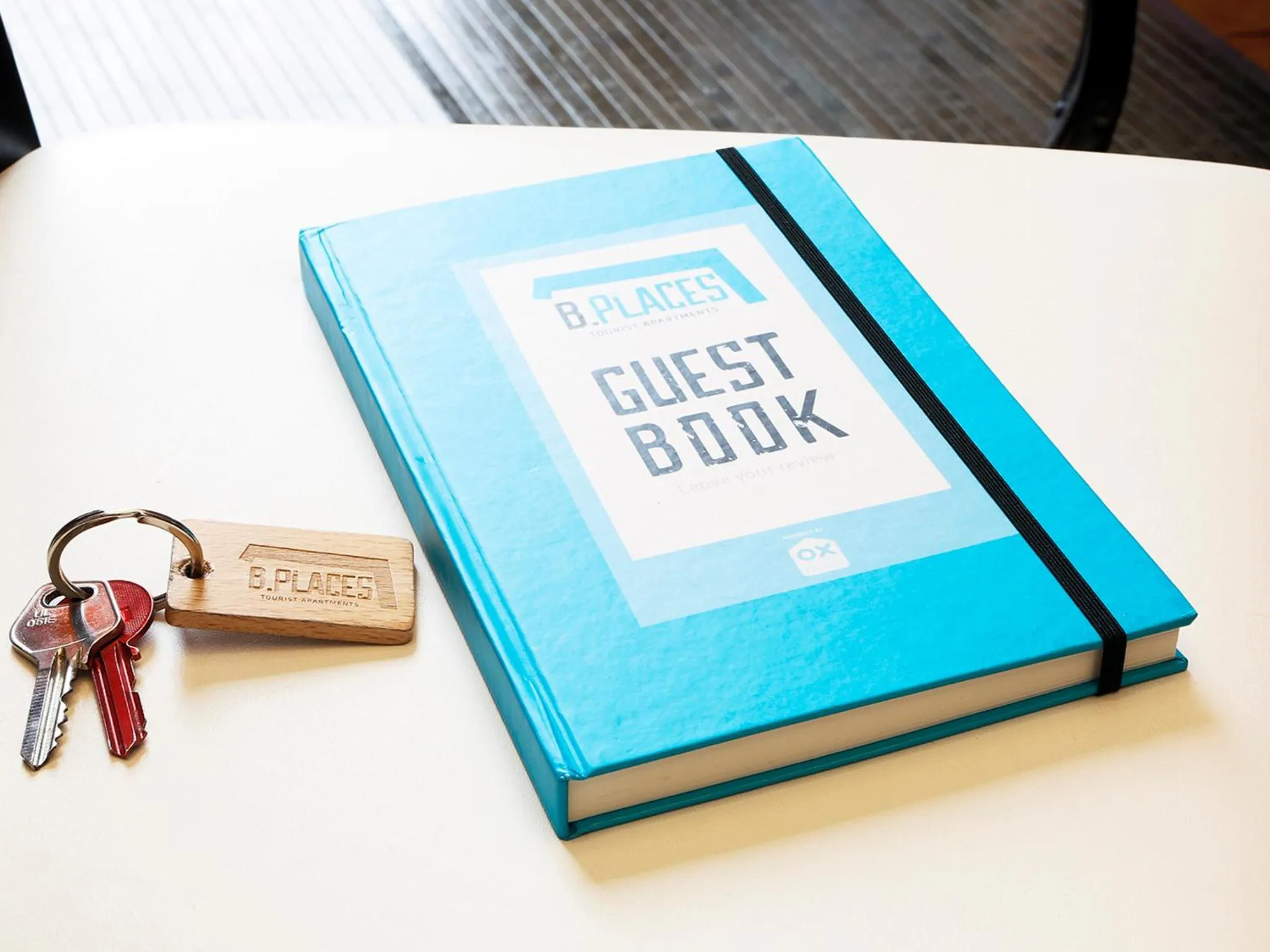 Property logo or sign in OX Apartments B Places