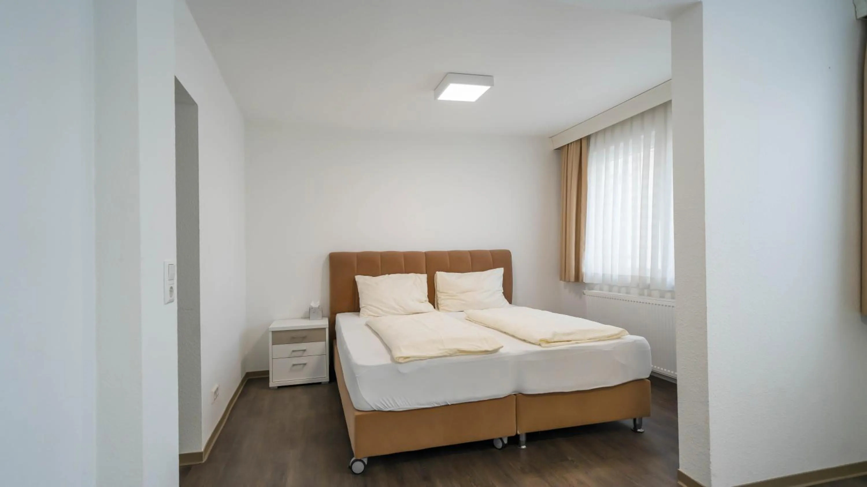 Bed in Comfort Boardinghouse