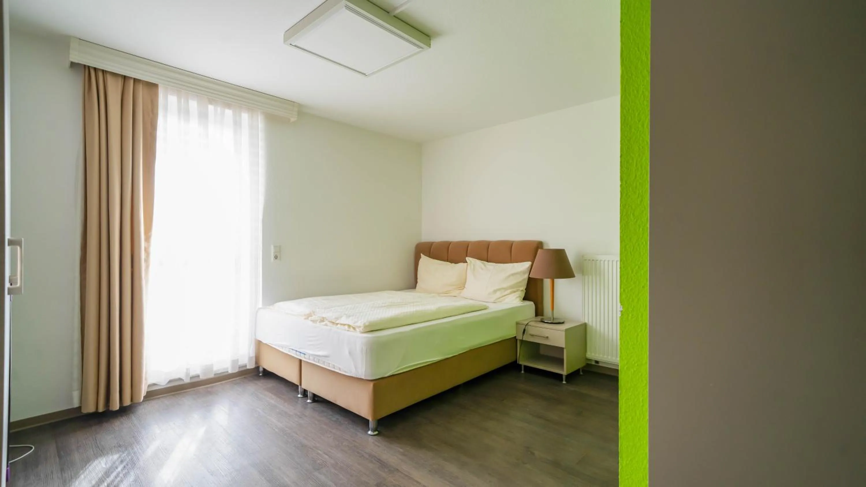 Bed in Comfort Boardinghouse