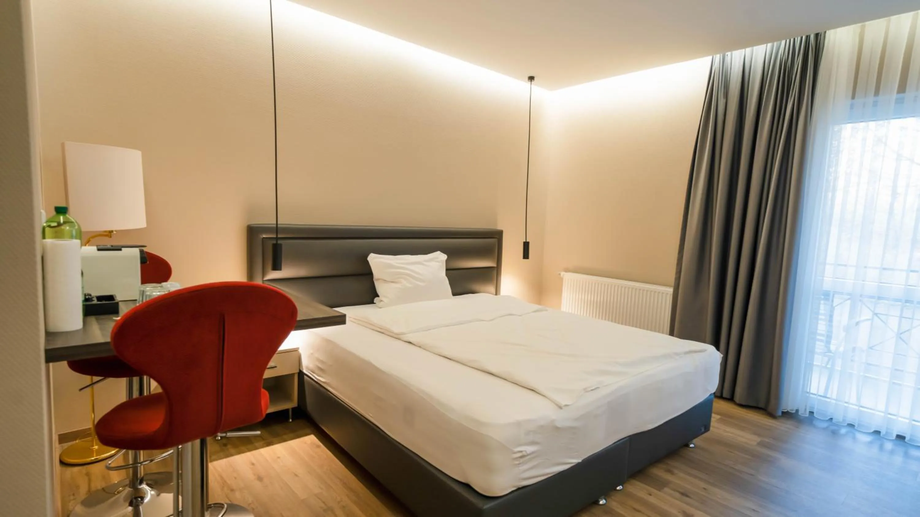 Bed in Comfort Boardinghouse