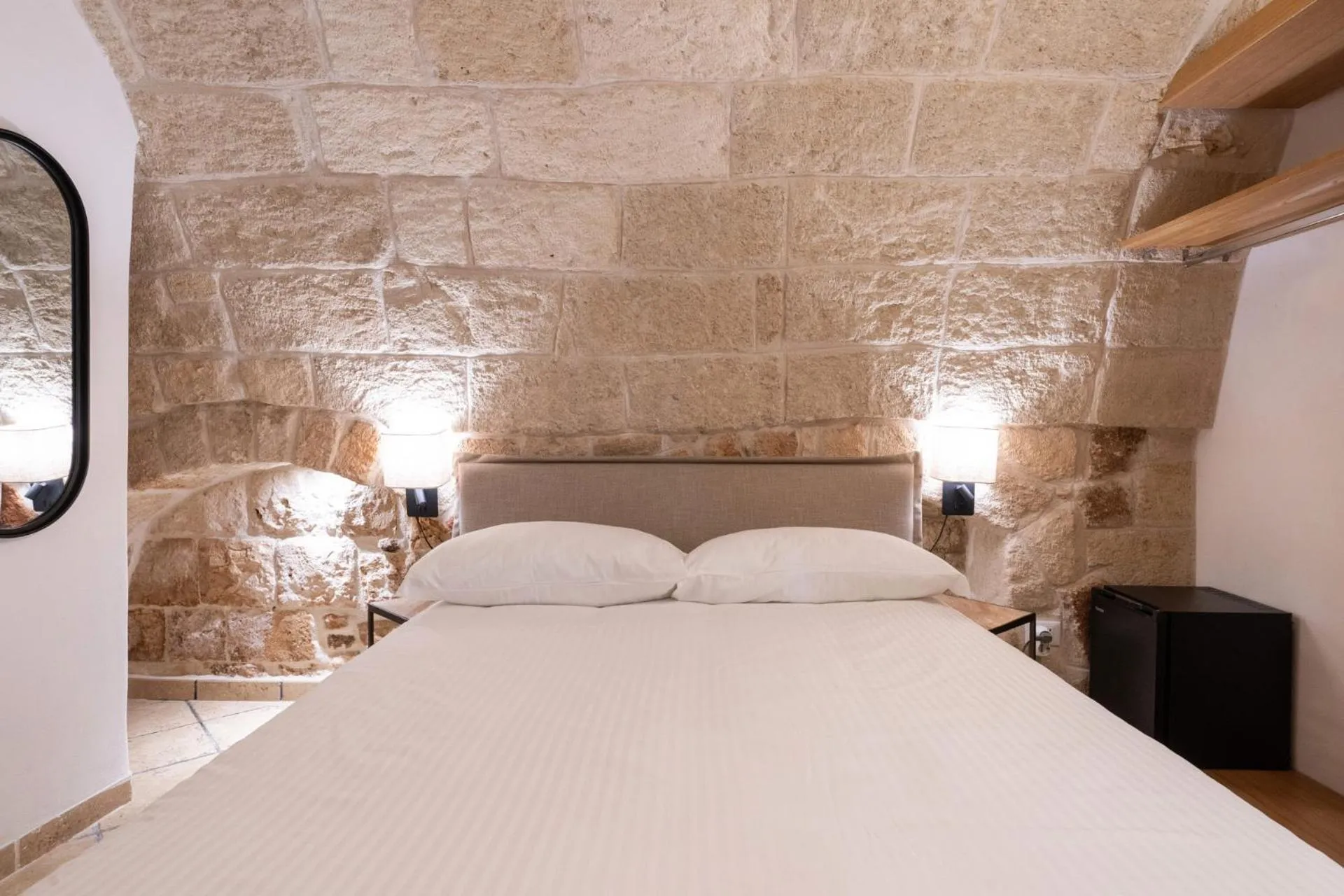 Bed in Santo Stefano Home & Breakfast