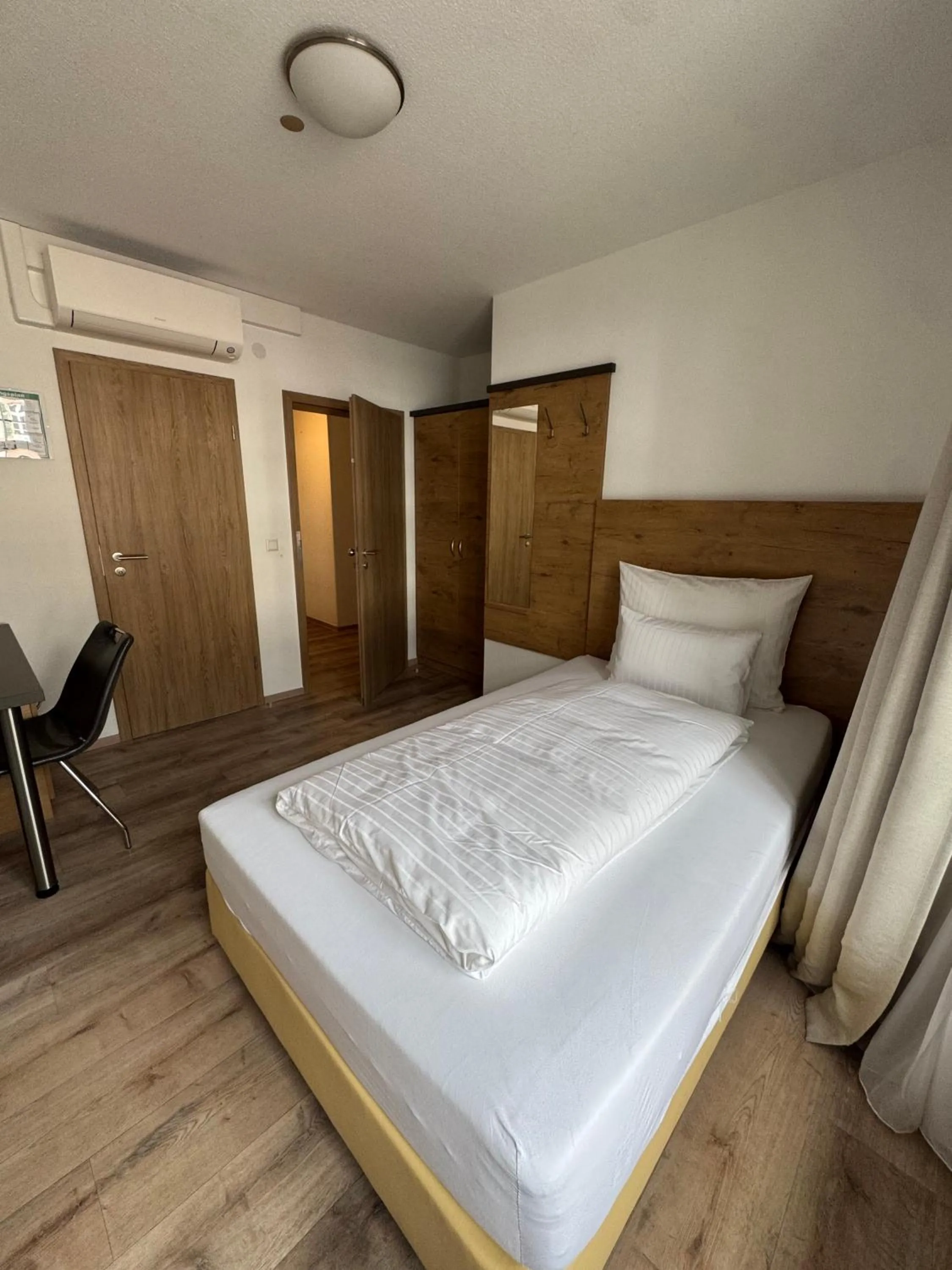 Bed in FLIP Boutique-Hotel near Basel - Modern Stay & Urban Food