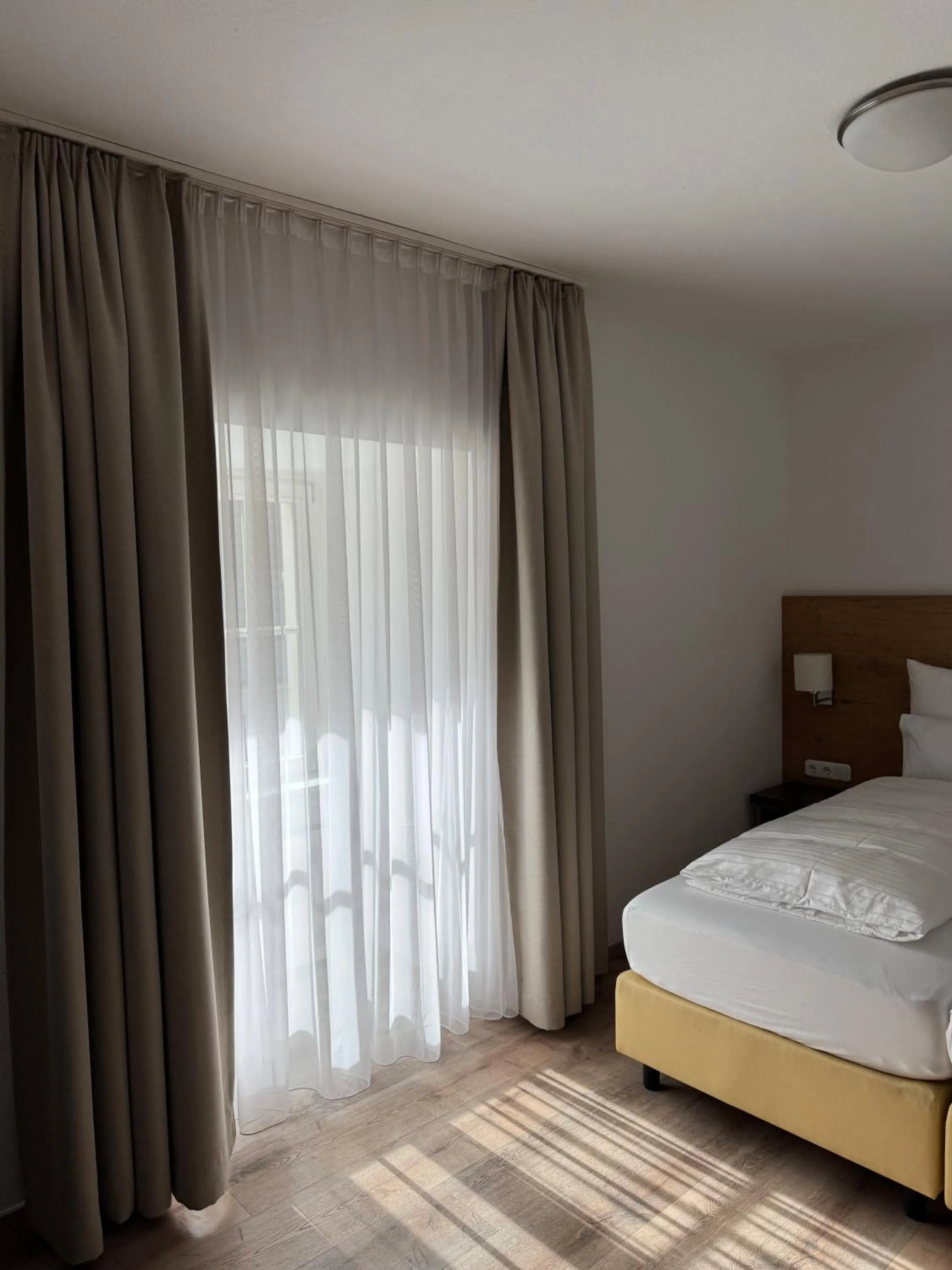 Bed in FLIP Boutique-Hotel near Basel - Modern Stay & Urban Food