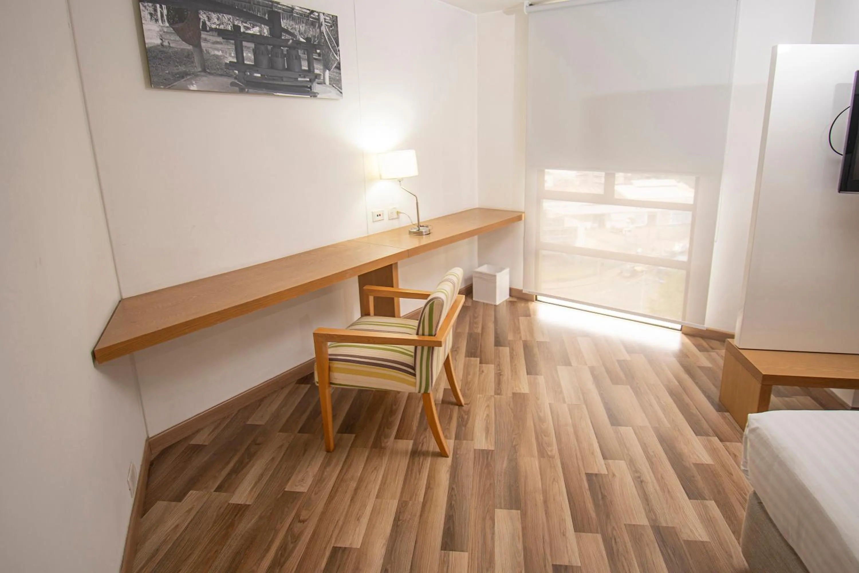 Seating area in Hotel Cosmos Cali