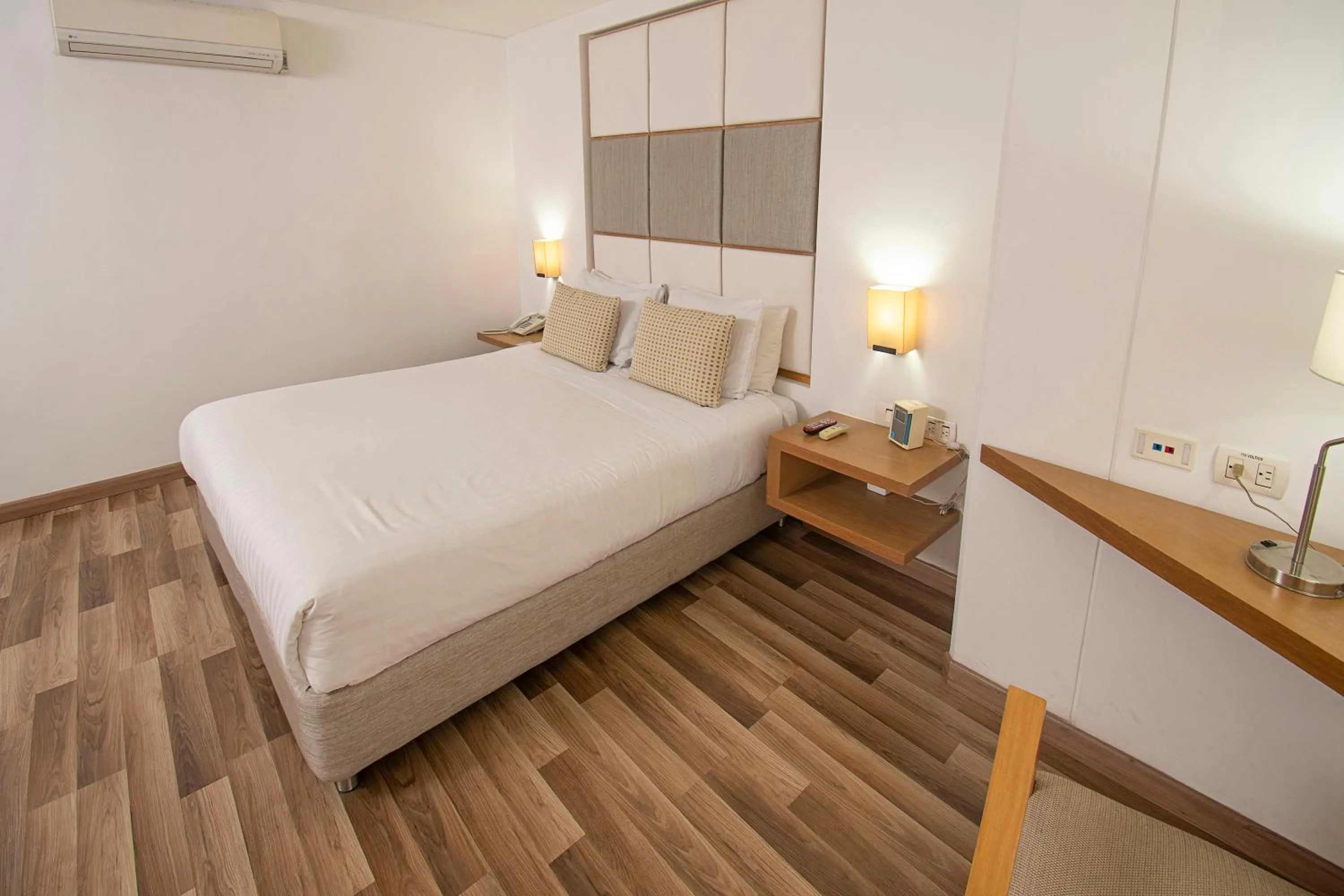 Bed in Hotel Cosmos Cali