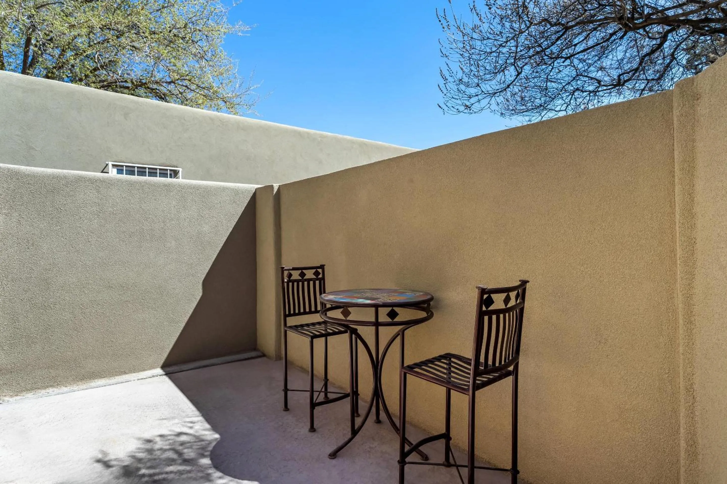 Bedroom in Casas de Suenos Old Town Historic Inn, an Ascend Collection Hotel