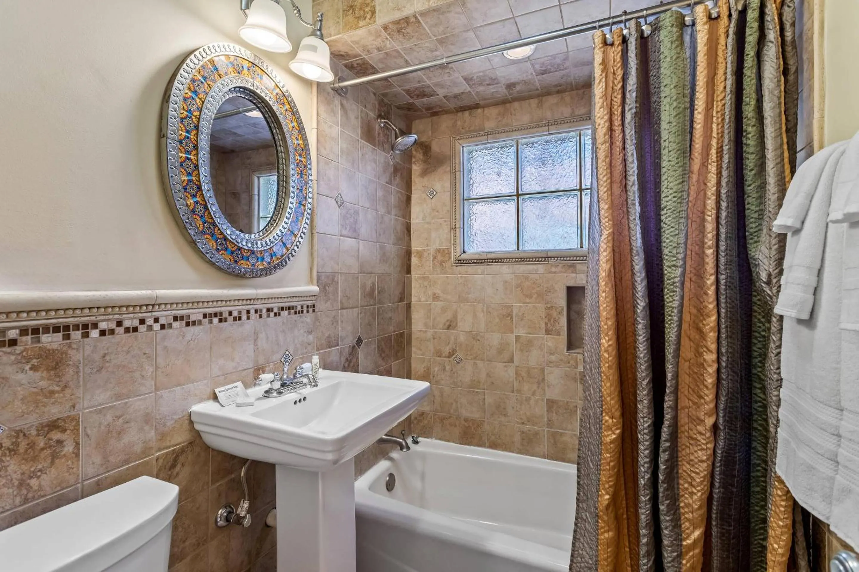 Bedroom in Casas de Suenos Old Town Historic Inn, an Ascend Collection Hotel
