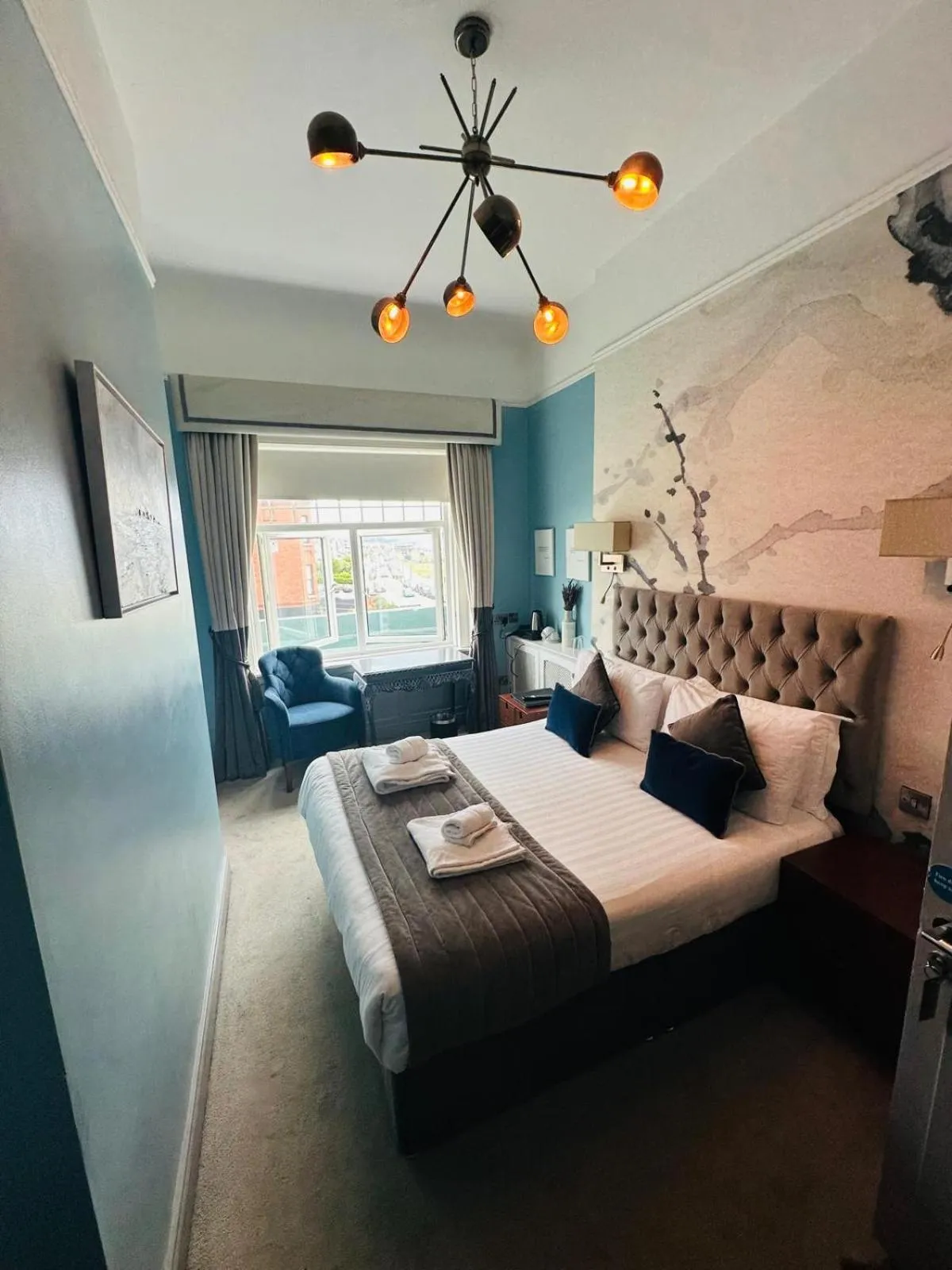 Bedroom, Bed in The Strand Hotel, the former residence of Oscar Wilde