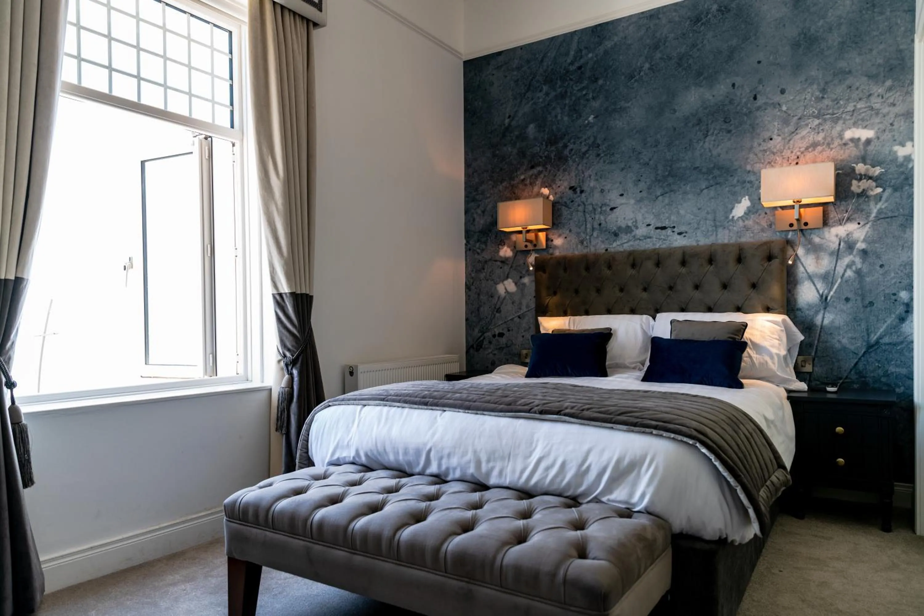 Photo of the whole room, Bed in The Strand Hotel, the former residence of Oscar Wilde