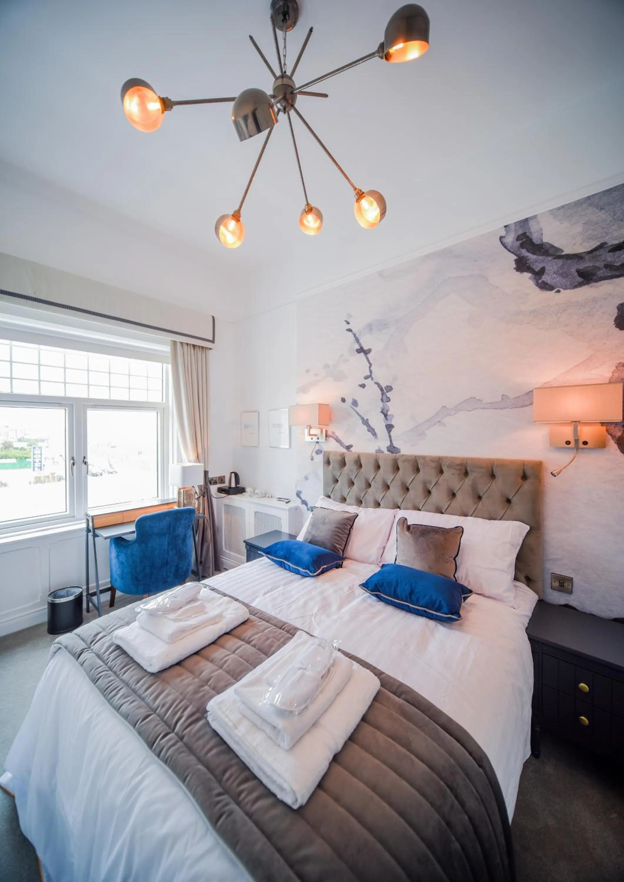 Photo of the whole room, Bed in The Strand Hotel, the former residence of Oscar Wilde