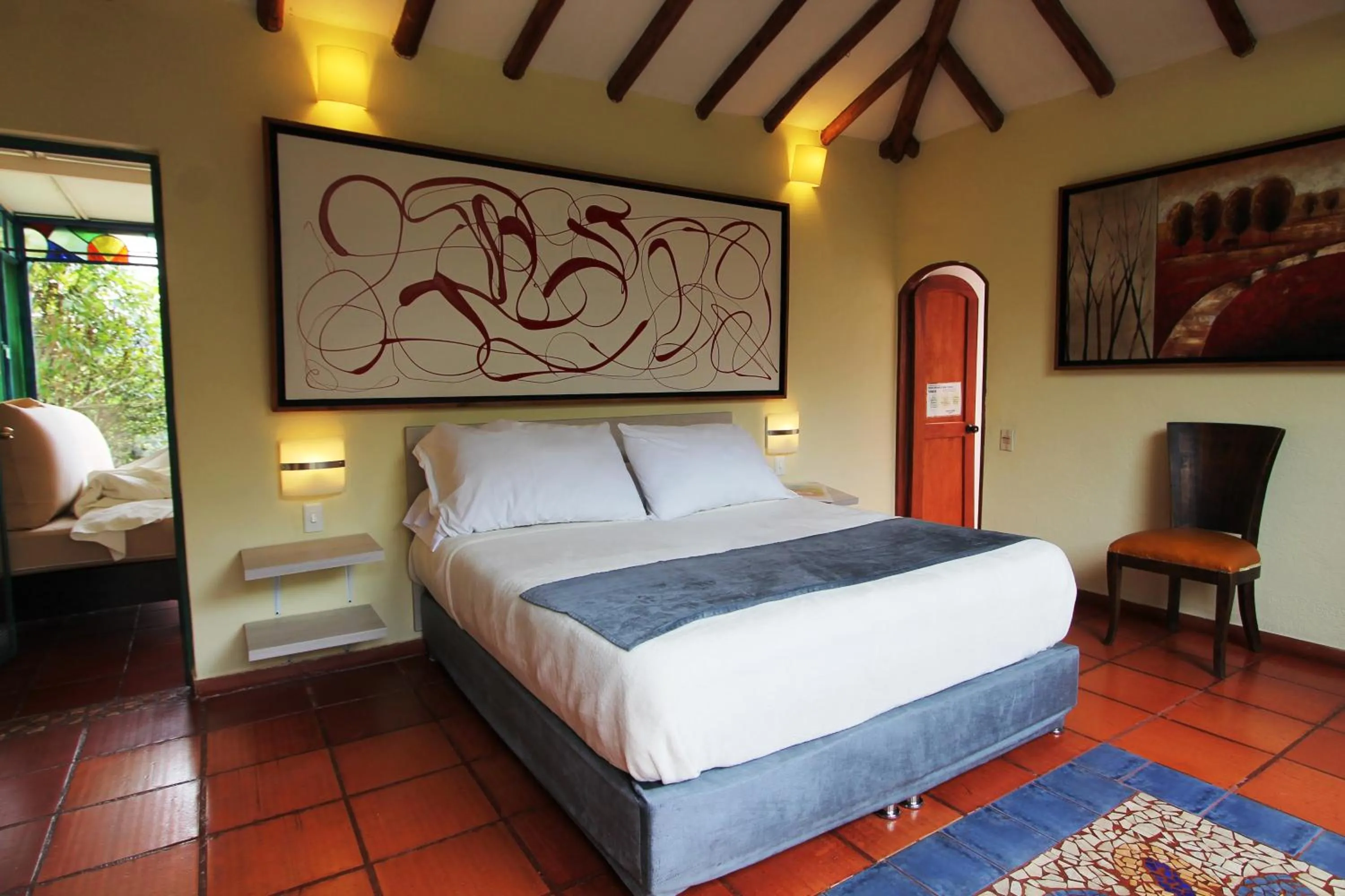 Bed in ApartaSuites Arcoiris