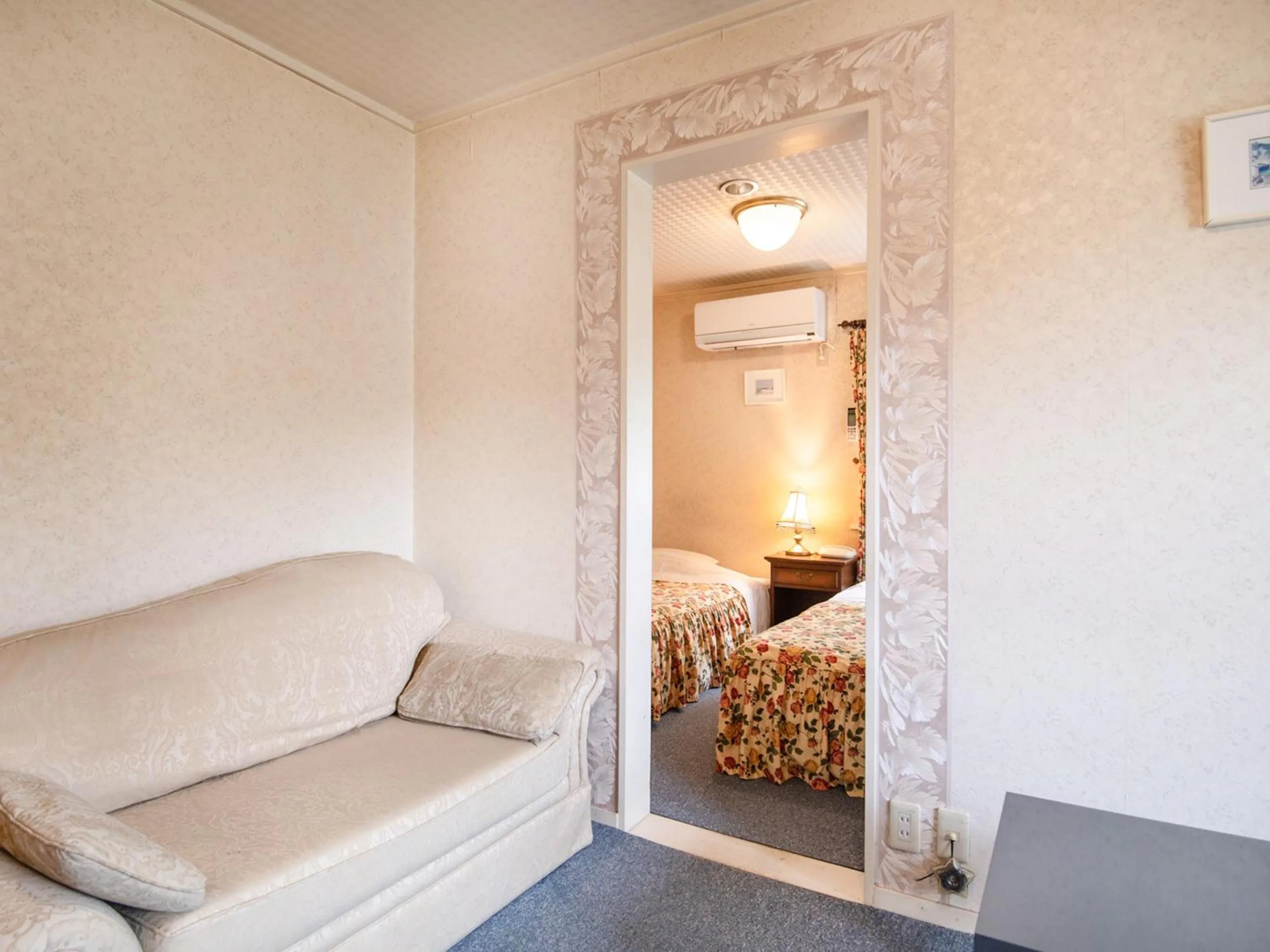 Living room, Bed in Gasthof Ami