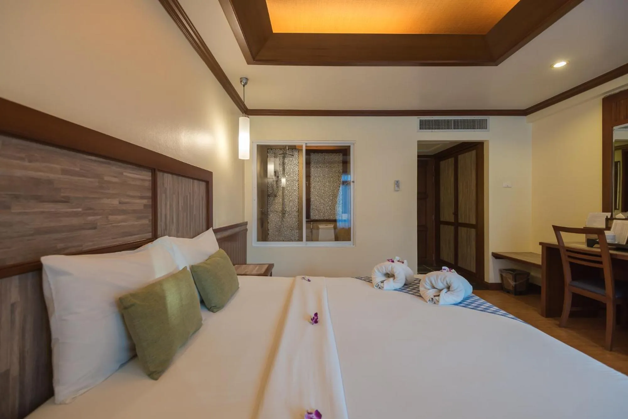 Bed in Mac Resort Hotel