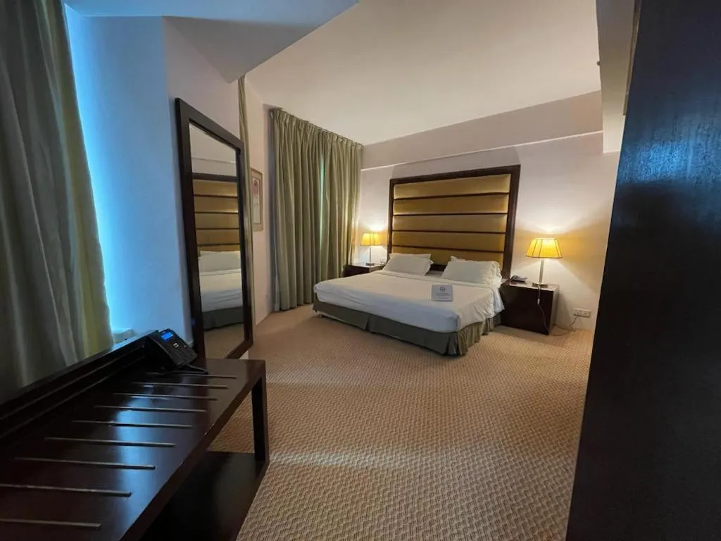 Bed in Oriental Crystal Hotel