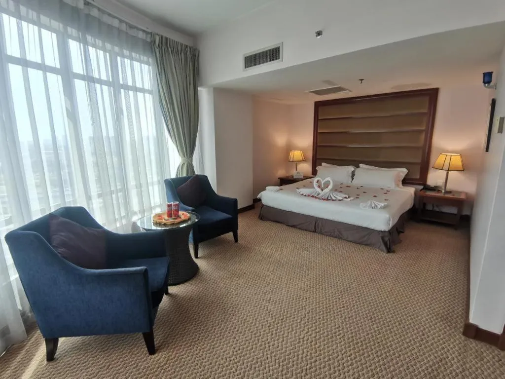 Bed in Oriental Crystal Hotel