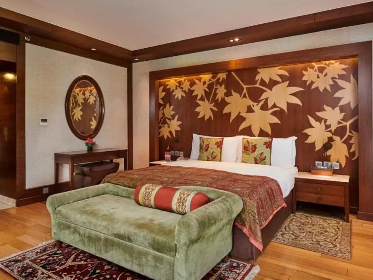 Bed in The LaLit Grand Palace Srinagar