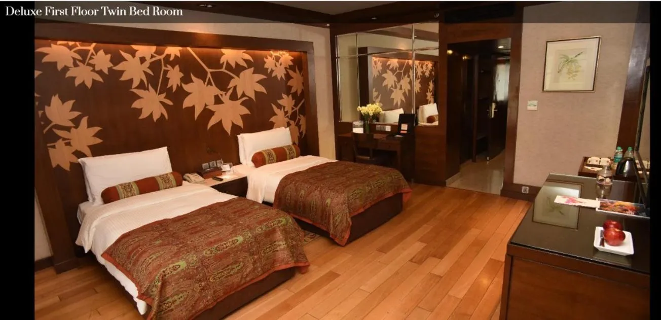 Bed in The LaLit Grand Palace Srinagar