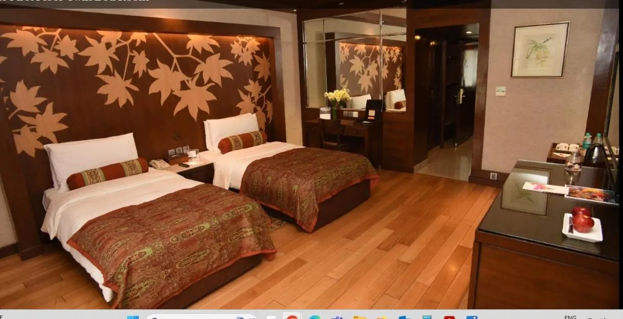 Bed in The LaLit Grand Palace Srinagar