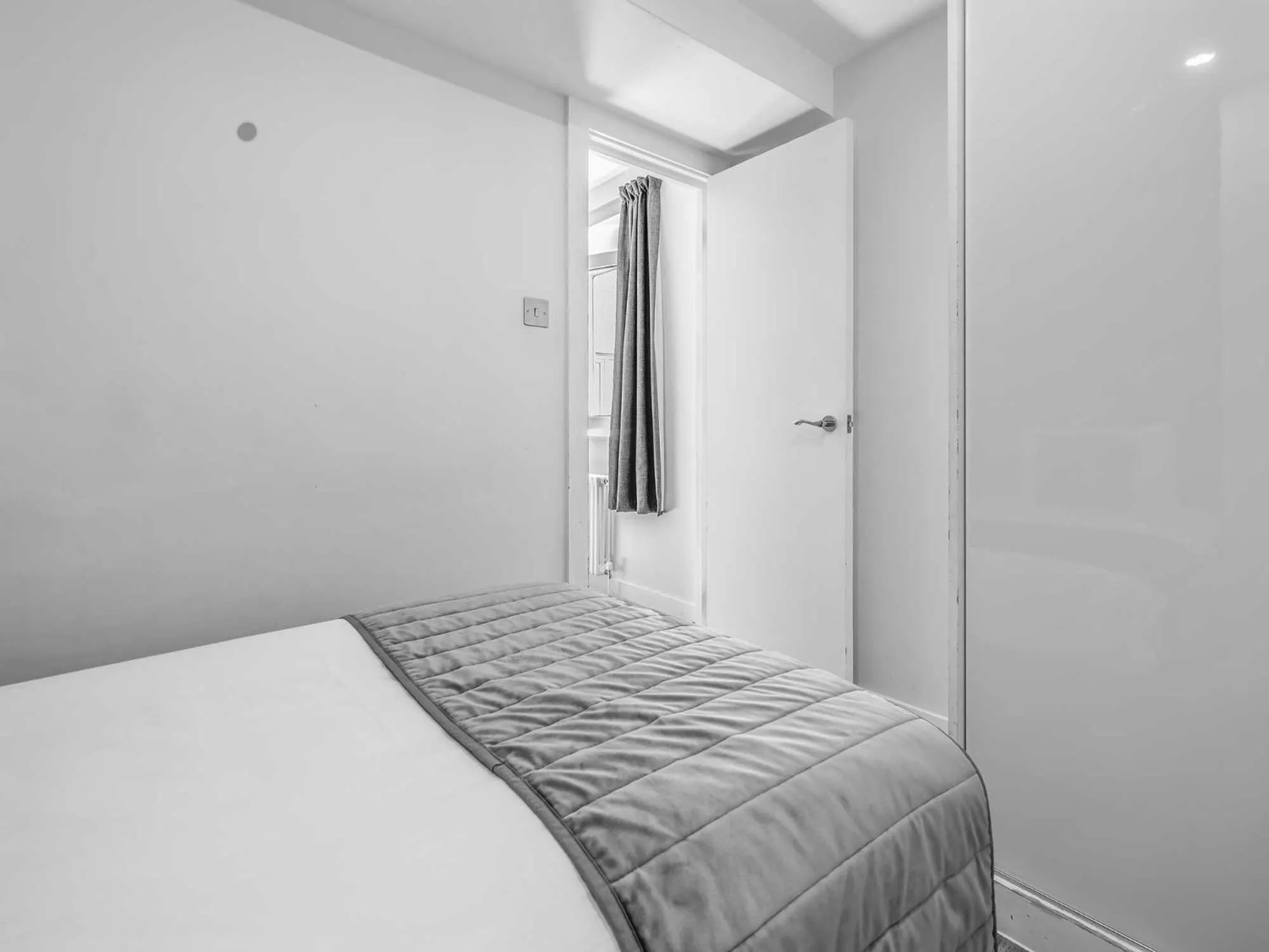 Bed in Chelsea Cloisters Serviced Apartments