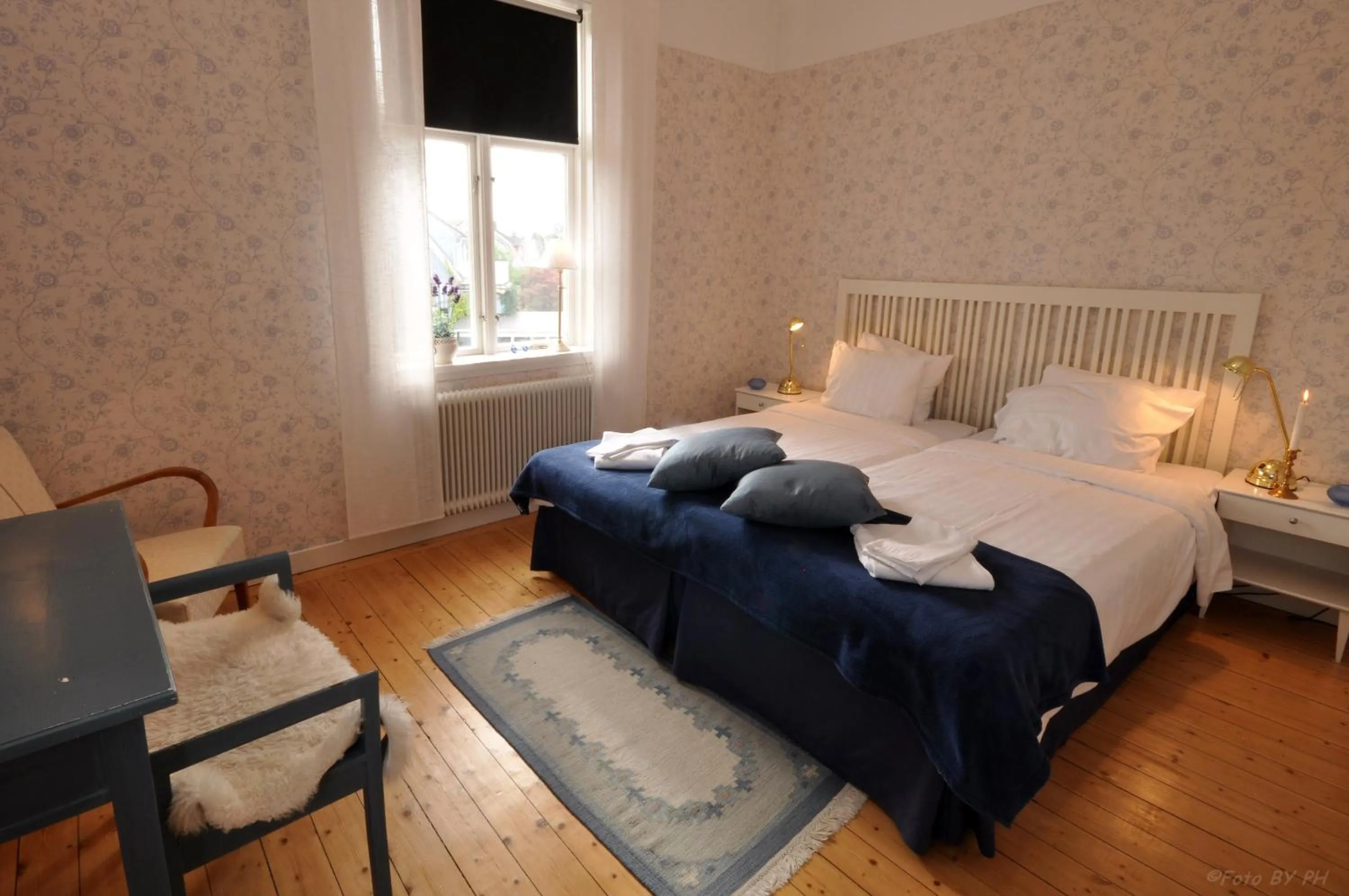 Photo of the whole room, Bed in Pensionat Prästgården