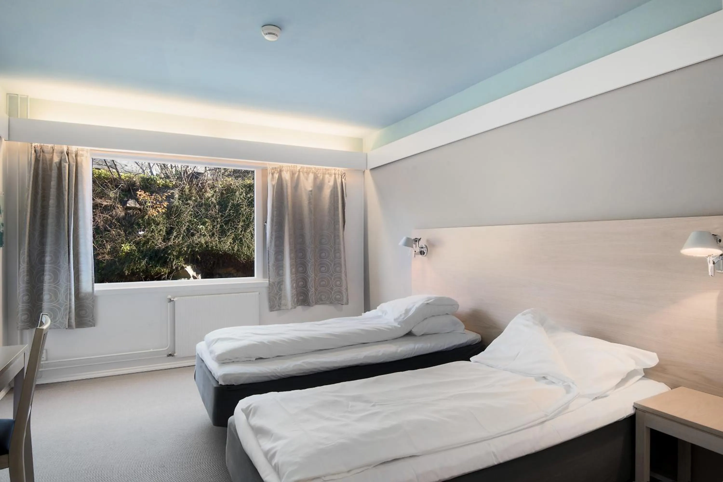 Bed in Oscarsborg Castle Hotel & Resort